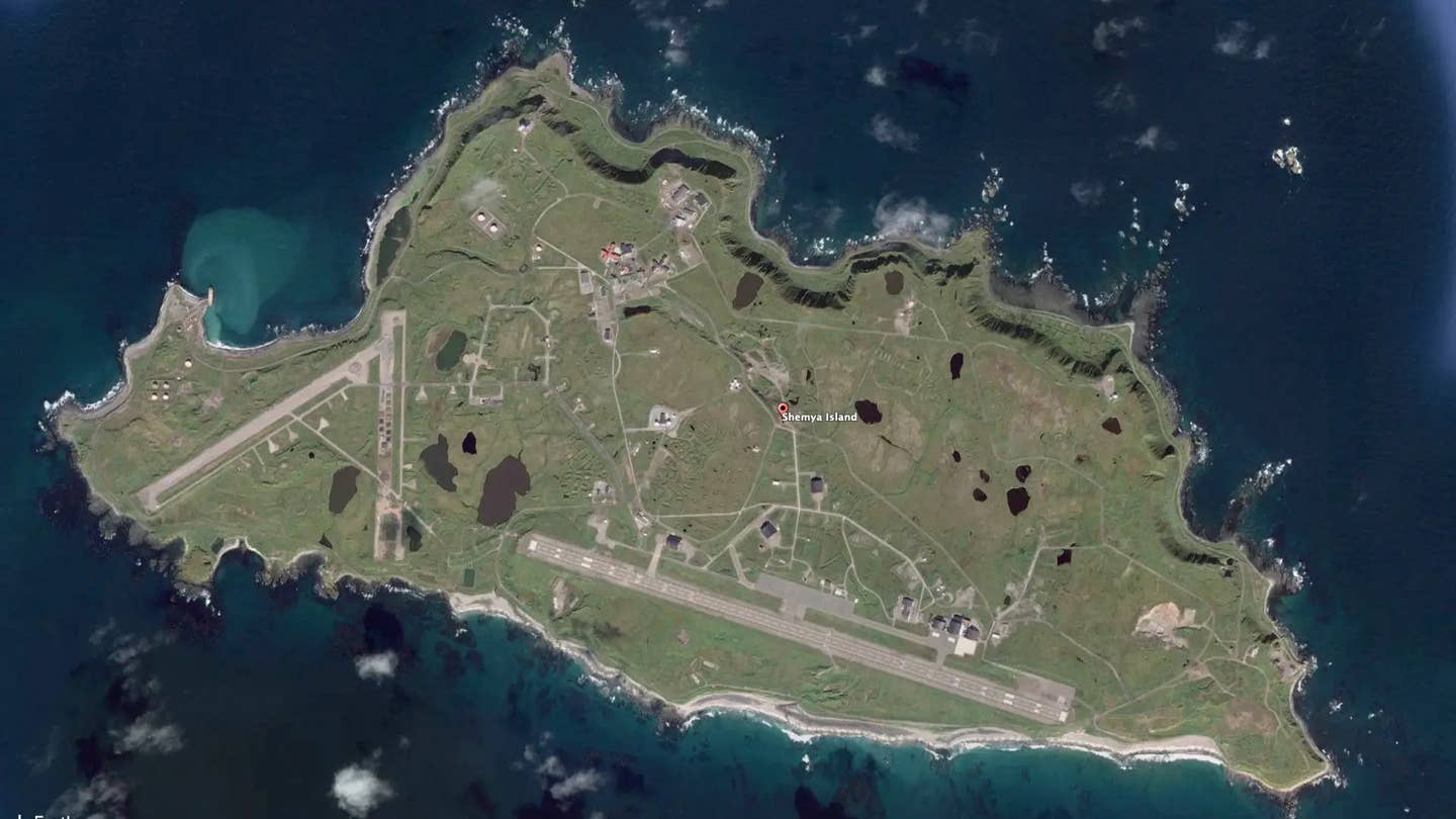 A satellite image of Shemya Island. What is now called Eareckson Air Station, with its lengthy runway, is seen along the southern edge. <em>Google Earth</em>