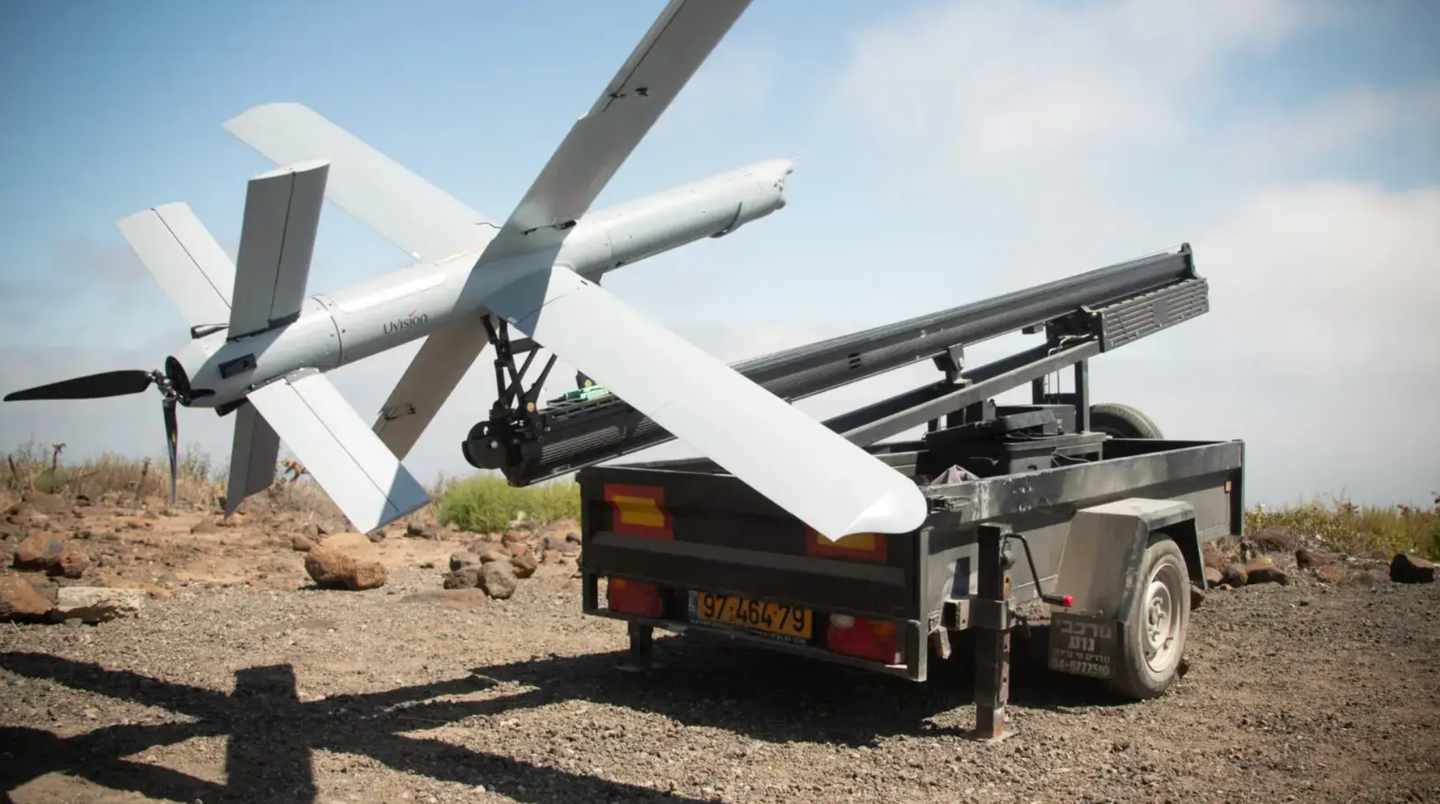 A UVision Hero-400 loitering munition on a trailer-mounted catapult launch system during a U.S. Marine Corps test in 2022.&nbsp;<em>USMC</em>