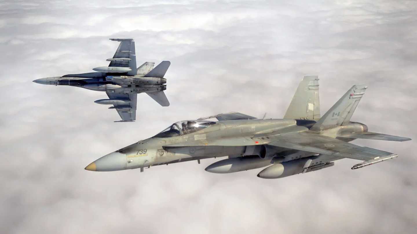 A CF-18 breaks away from its leader. Credit: RCAF