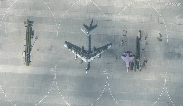 Another closeup of a Russian Tu-95 Bear bomber with tires on the wings and top of the center fuselage at Engels Air Base, taken Aug. 28. (Satellite image ©2023 Maxar Technologies)