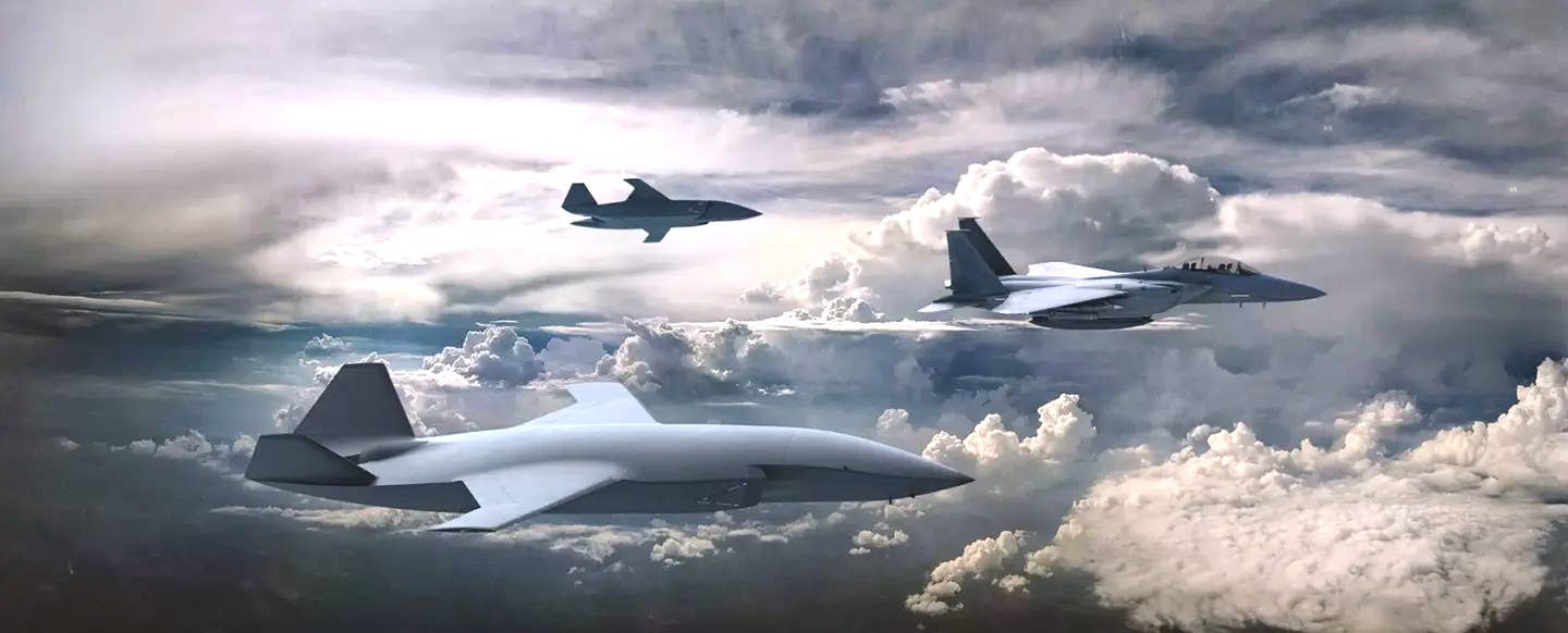 Boeing concept art showing an F-15EX or related variant flying together with a pair of MQ-28 Ghost Bat drones. Ghost Bat is another Boeing product that was originally developed by the company's division Australia for the Royal Australian Air Force's Airpower Teaming System (ATS) program. <em>Boeing</em>