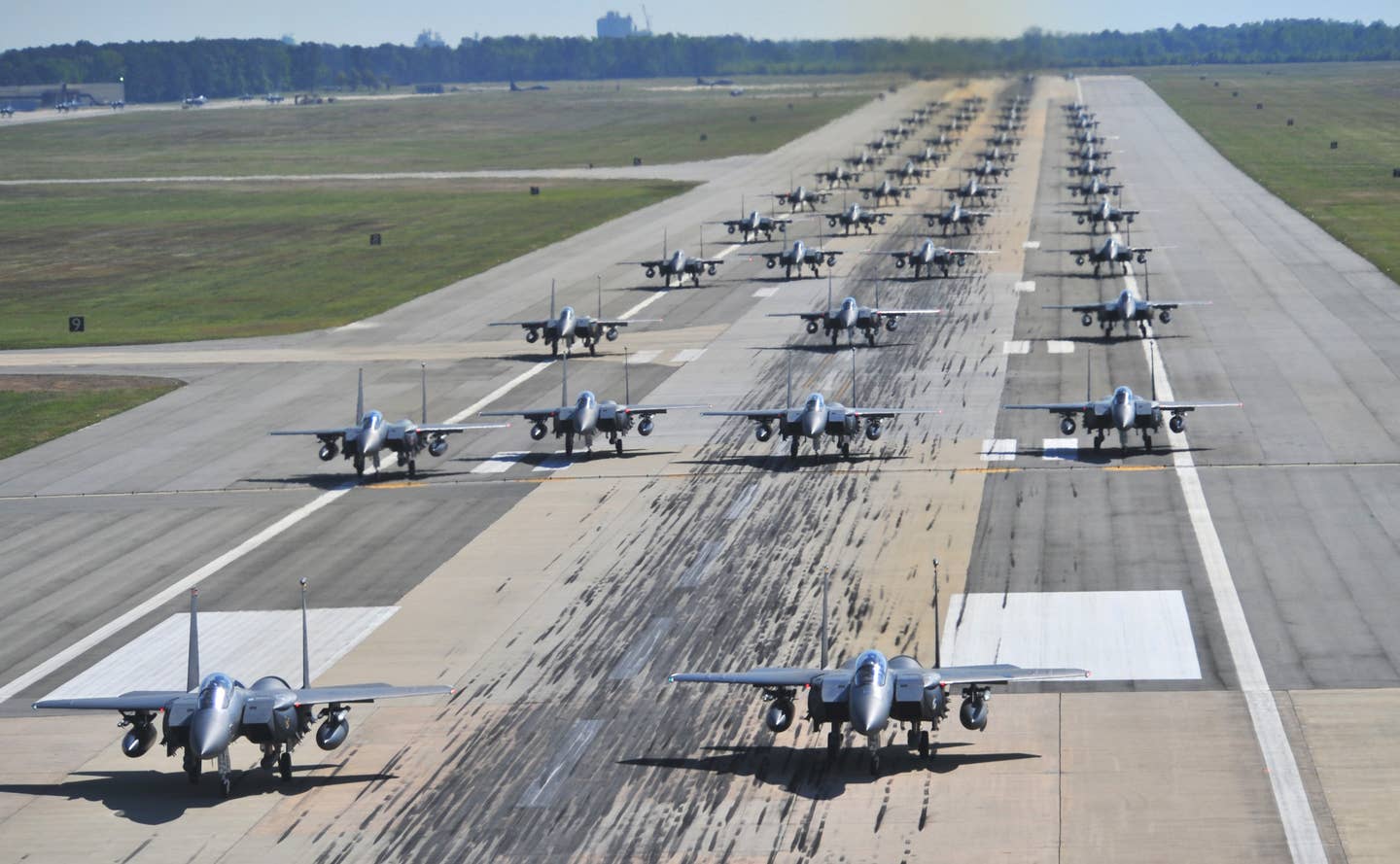 70 F-15E Strike Eagles take part in a large-scale<em> </em>readiness exercise, or 'Elephant Walk," at Seymour Johnson Air Force Base in North Carolina in 2012. <em>USAF</em>