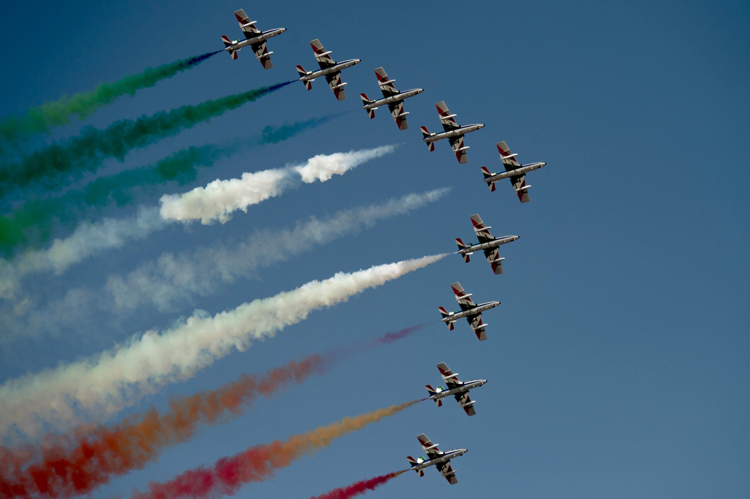 The Frecce Tricolori, the Italian Aeronatica Militare's aerobatic demonstration team, performs Nov. 10, 2015 at the 2015 Dubai Air Show, United Arab Emirates. The air show is a biennial event and is recognized as the premier aviation and air industry event in the Gulf and Middle East region and is one of the largest air shows in the world. (U.S. Air Force photo by Tech. Sgt. Nathan Lipscomb)