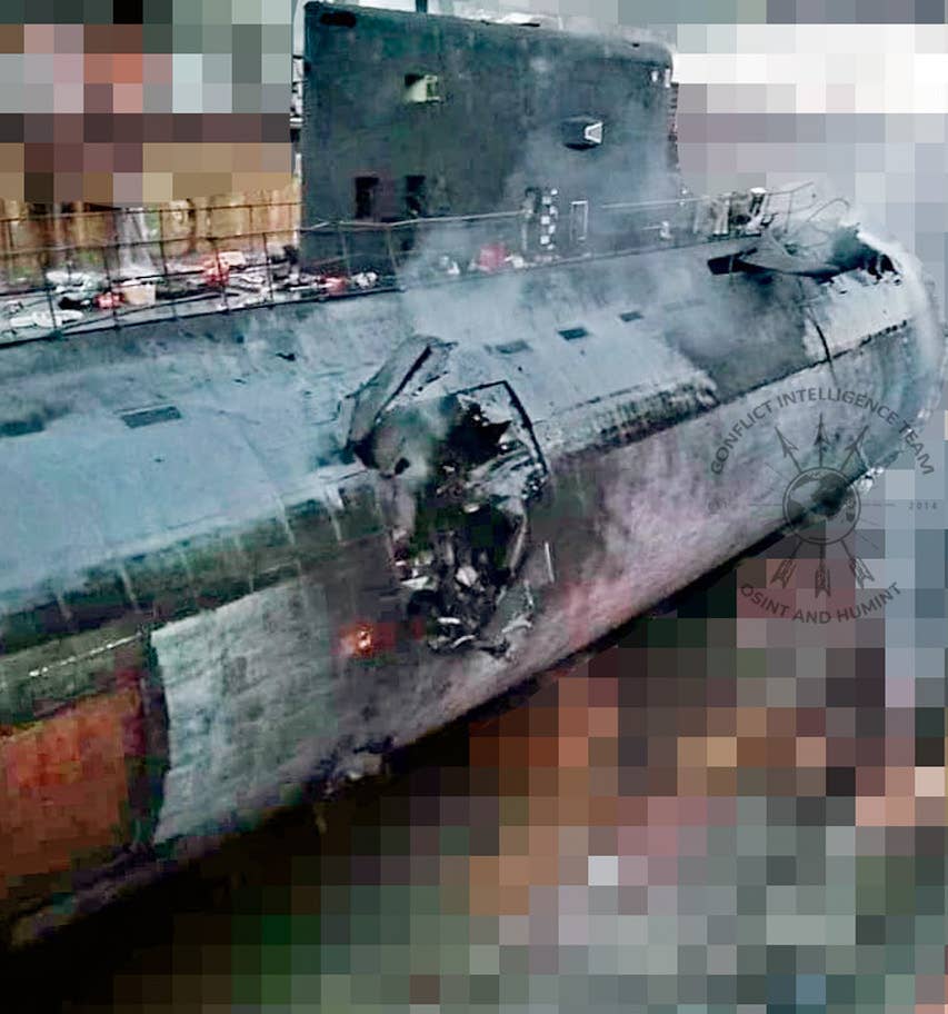 One of two photos of the damage to the<em> Improved Kilo</em> class submarine apparently first published by the Conflict Intelligence Team. <em>CIT via X</em>