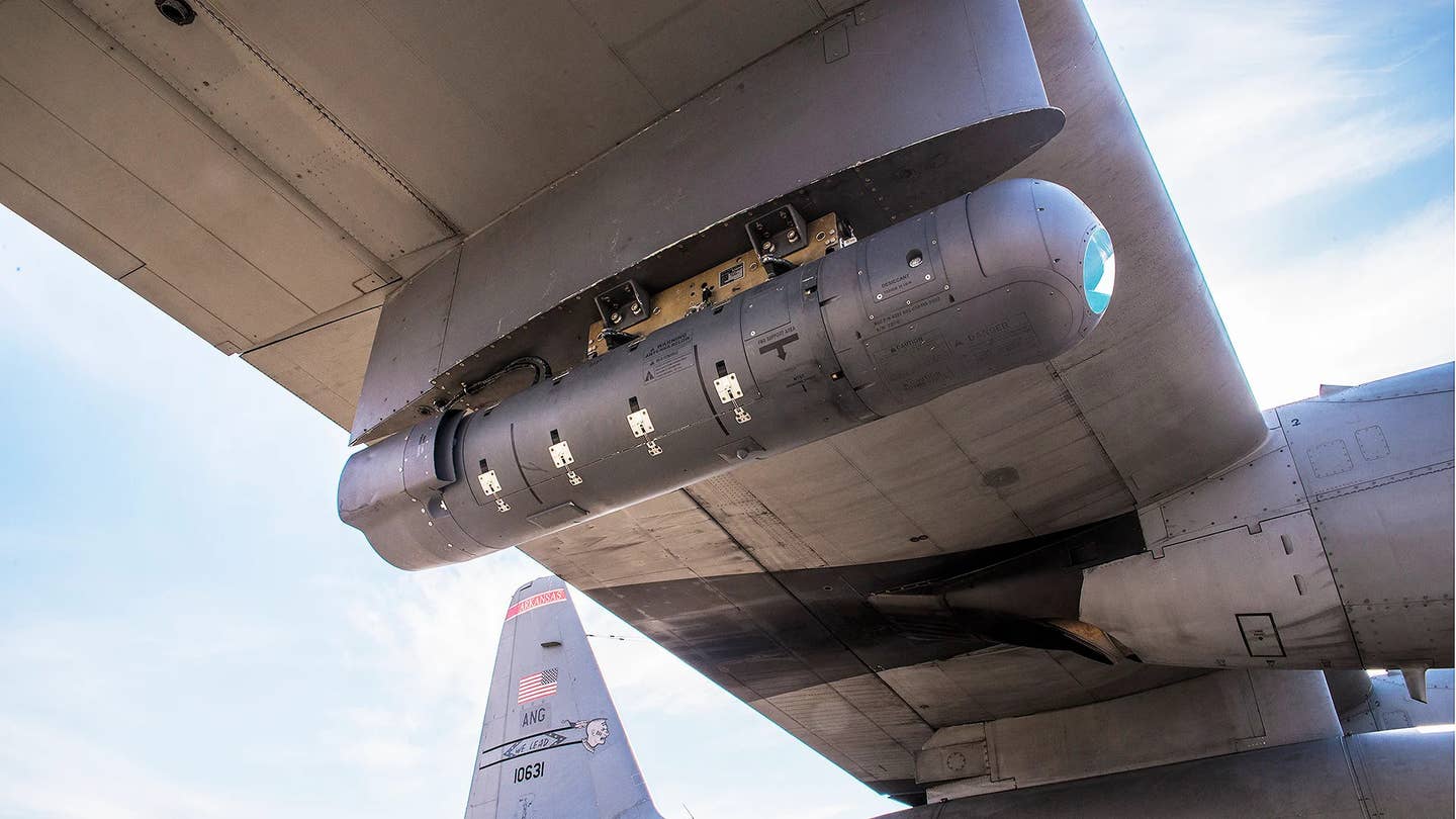 A Litening sensor pod under the wing of a C-130 airlifted. <em>USAF</em>