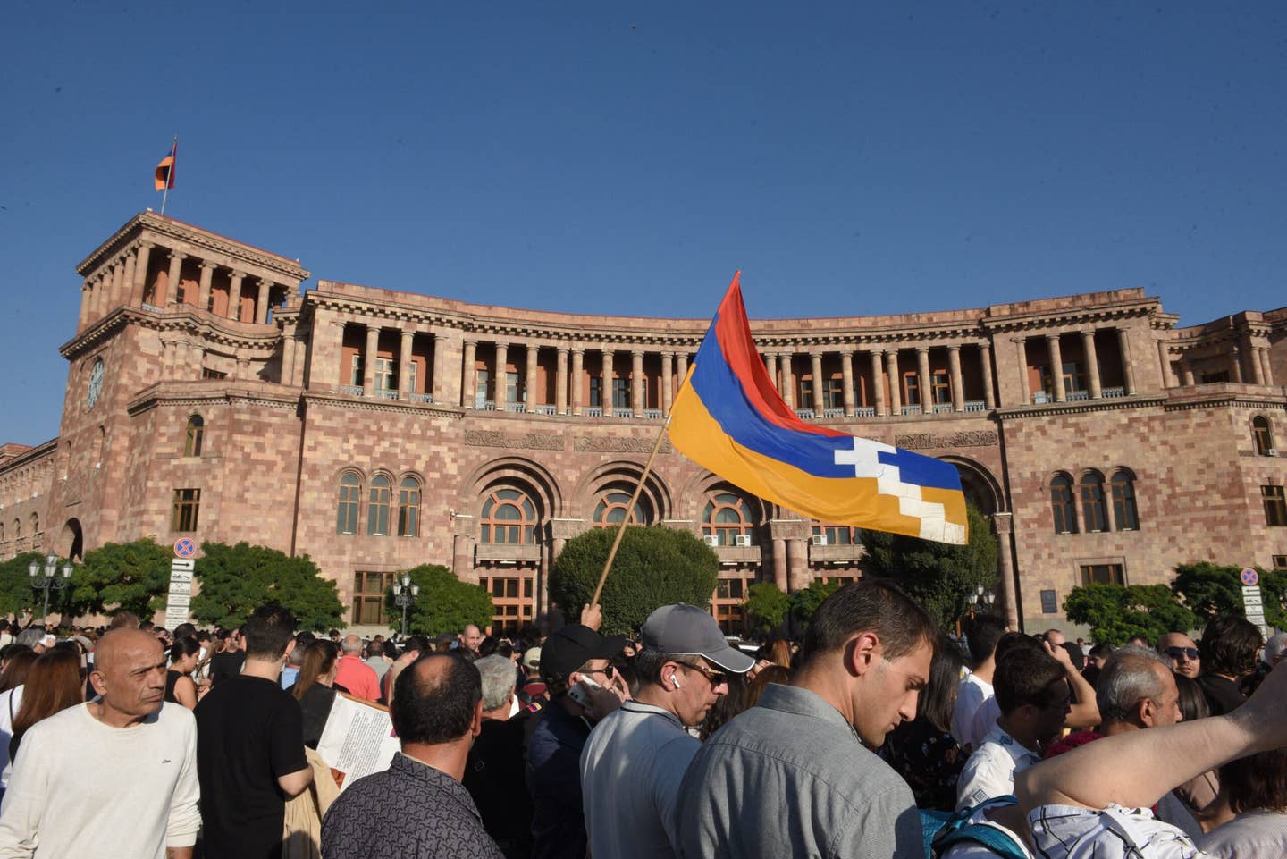 Armenians protest to urge the government to respond to the Azerbaijani military operation launched against the breakaway Nagorno-Karabakh region outside the government building in central Yerevan on September 19, 2023. <em>Photo by KAREN MINASYAN/AFP via Getty Images</em>