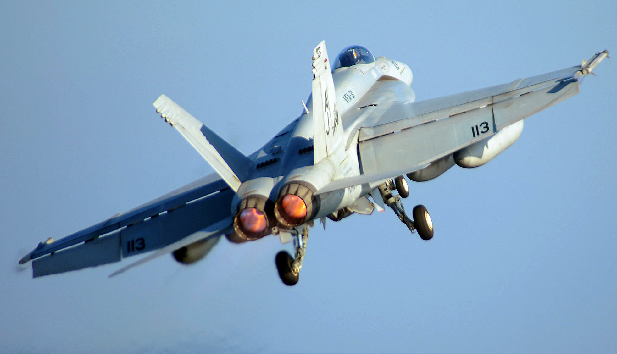 An F/A-18 Super Hornet assigned to the "Tomcatters" of Strike Fighter Squadron 31 launches from the flight deck of the Nimitz-class aircraft carrier USS Theodore Roosevelt. Theodore Roosevelt and embarked Carrier Air Wing 8 are operating in the U.S. 5th Fleet area of responsibility and are focused on reassuring regional partners of the United States' commitment to security, which promotes stability and global prosperity (U.S. Navy photo by Mass Communication Specialist 3rd Class Jonathan Snyder/Released)