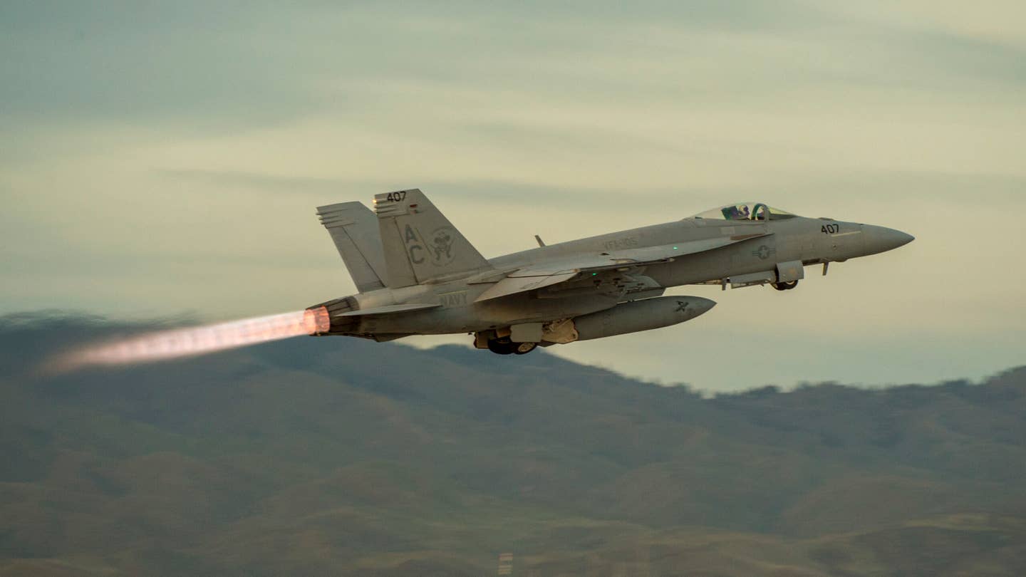 A VFA-105 'Gunslingers' F/A-18E takes off on a training sortie. (U.S. Air National Guard photo by Ryan White)