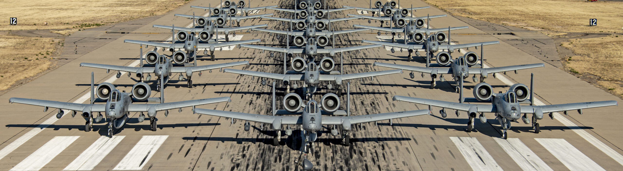 U.S. Air Force A-10 Thunderbolt IIs, an HH-60G Pave Hawk and an HC-130J Combat King II assigned to the 355th Wing taxi in formation on the runway at Davis-Monthan Air Force Base, Arizona, Feb. 9, 2022. The 355th Wing maintains and operates A-10 Thunderbolt IIs, HH-60G Pave Hawks and HC-130J Combat King IIs ensuring its Airmen and aircraft are ready to fly, fight and win. (U.S. Air Force photo by Senior Airman Alex Miller)