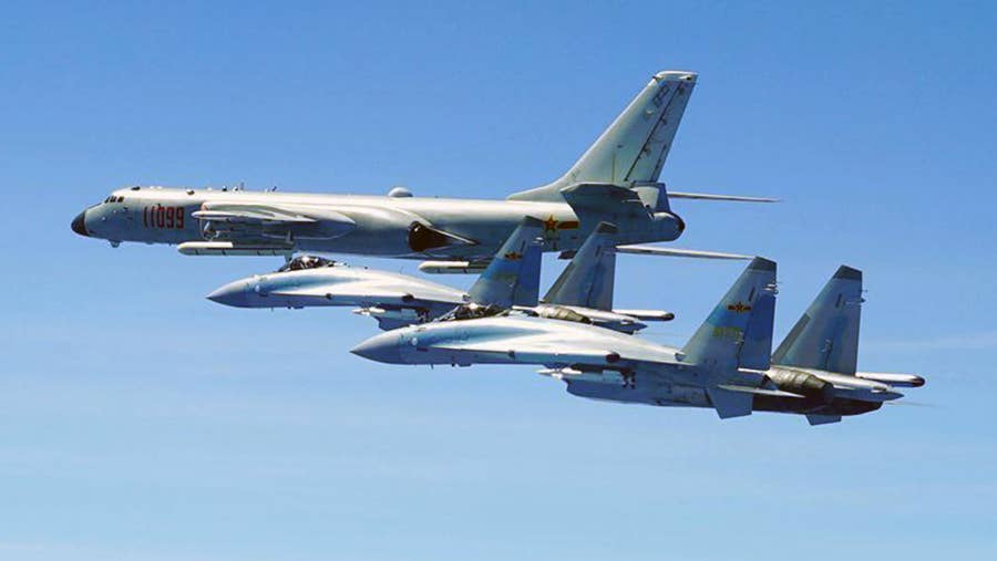 Chinese H-6 and Flanker derivatives fly in formation. (PLAAF)