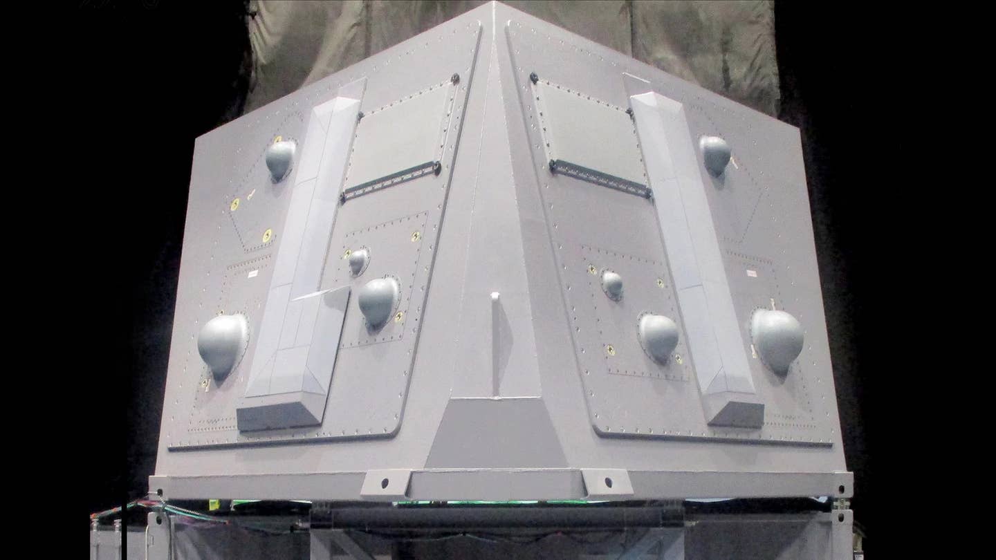 A developmental SEWIP Block III module on a test rig on the ground. The system's installation on<em> Arleigh Burke</em> class destroyers includes one modules on either side of the main superstructure. <em>Northrop Grumman</em>