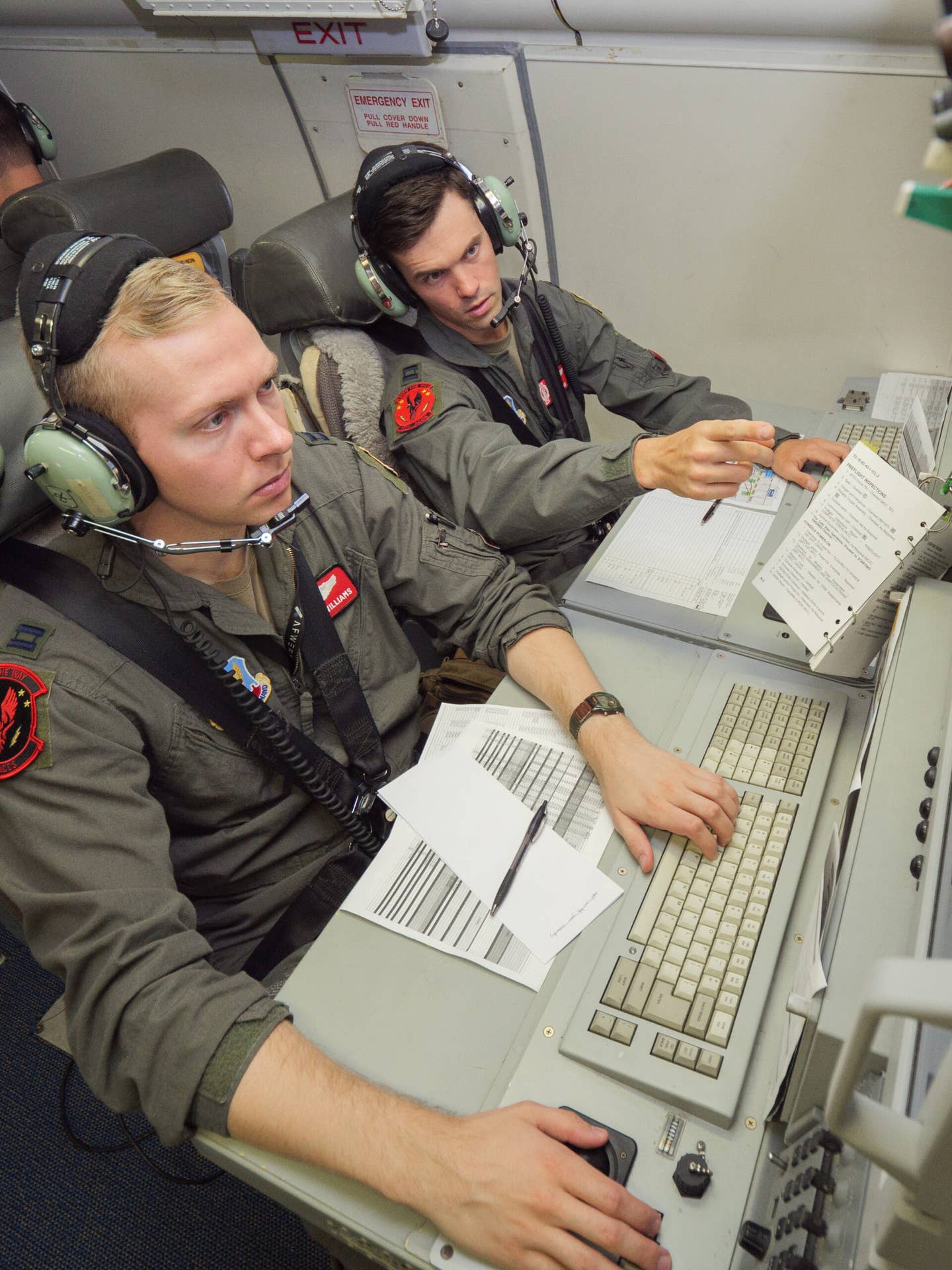 E-8C Joint STARS aircrew members from the 116th Airborne Command and Control Squadron, 461st Air Control Wing, prepare for a training mission at Robins Air Force Base, Georgia, September 8, 2022. <em>U.S. Air National Guard photo by Senior Master Sgt. Roger Parsons</em>