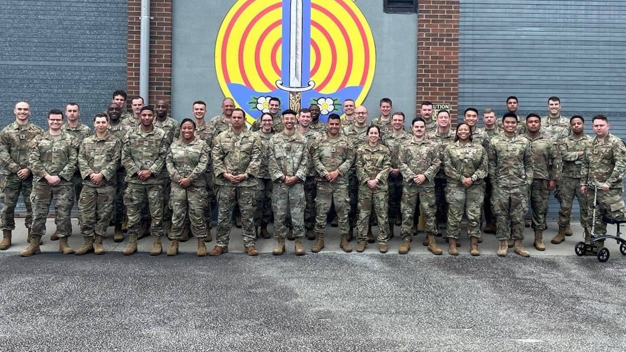 Graduating members with the 129th and 330th Combat Training Squadrons’ first Initial Qualification Training class for the new Tactical Operations Center, in May 2023. They completed training at Hunter Army Airfield in Savannah, Georgia, and will become Air Battle Managers and Mission System Operators. <em>U.S. Air Force photo by Maj. Daniel Van Stone</em><br>