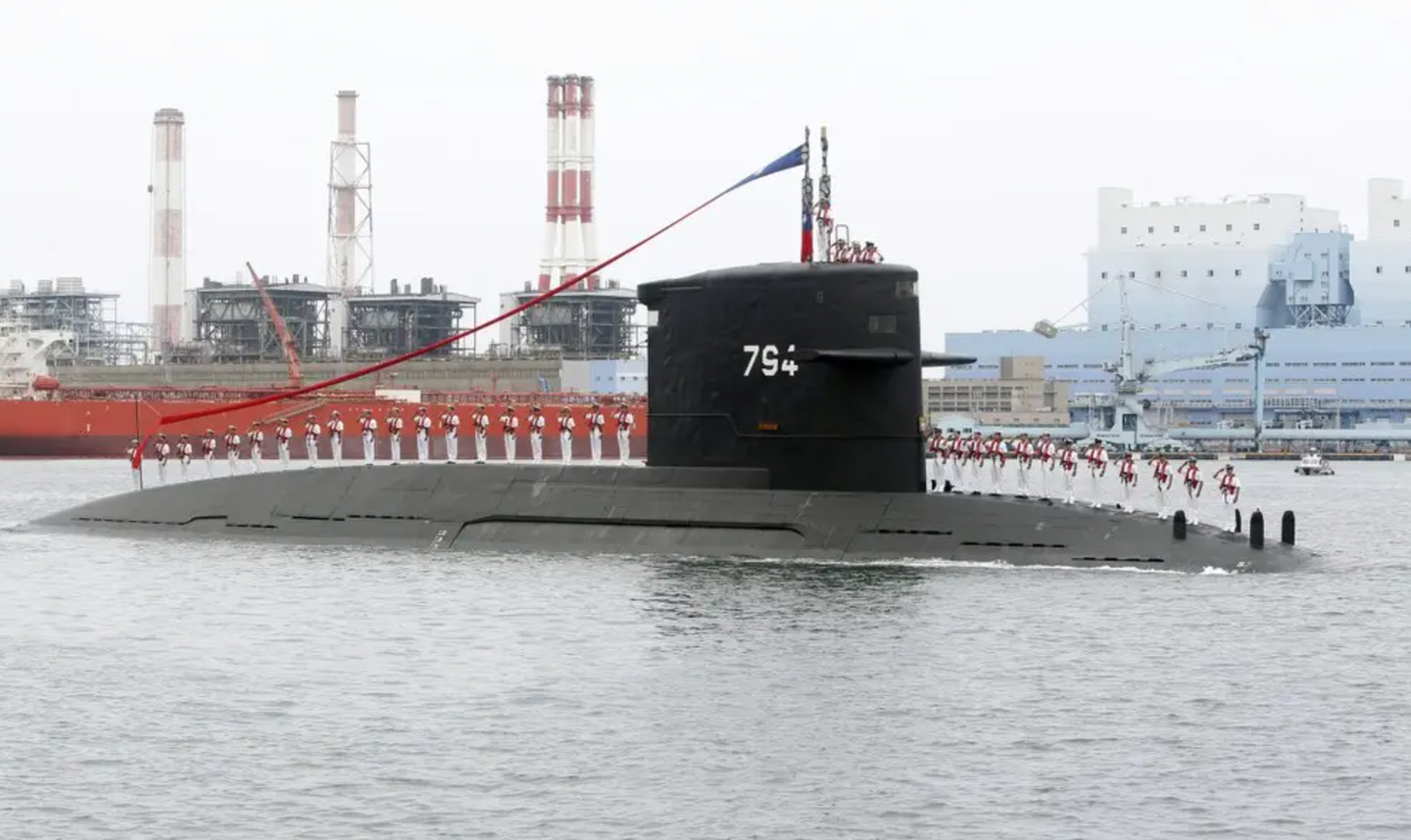 Taiwanese sailors salute aboard the&nbsp;<em>Hai Lung</em>&nbsp;class submarine&nbsp;<em>Hai Hu</em>, which was commissioned into ROCN service in 1988.&nbsp;<em>AP/Chiang Ying-ying</em>