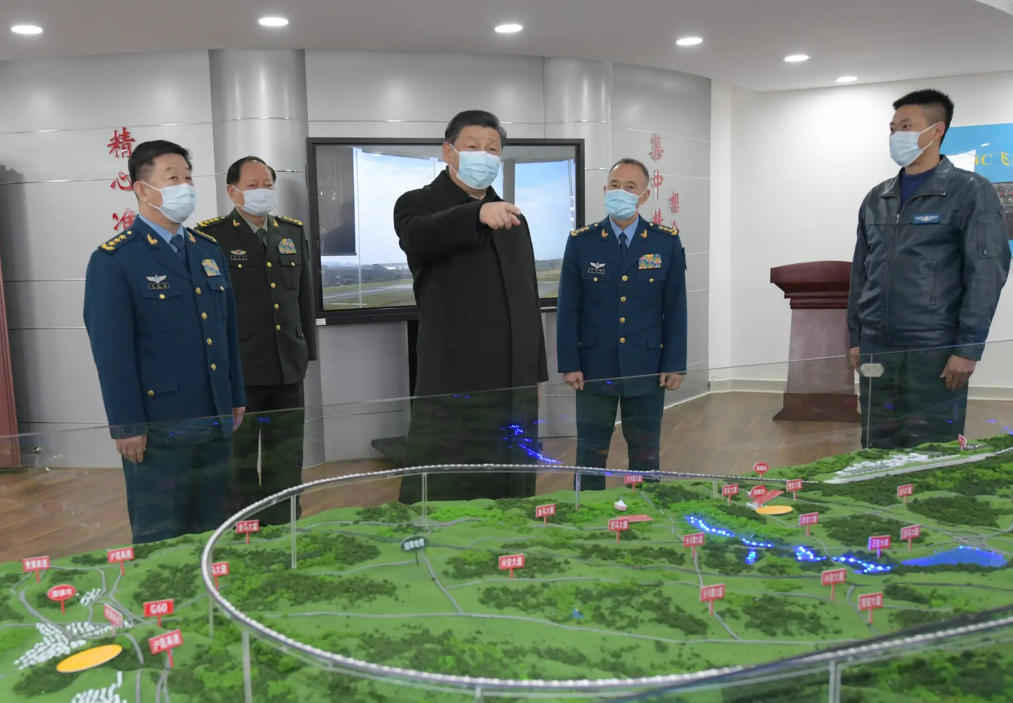 Chinese President Xi Jinping, also general secretary of the Communist Party of China CPC Central Committee and chairman of the Central Military Commission CMC, learns about the training of soldiers and officers during a visit to a PLA unit in southwestern Guizhou Province.&nbsp;<em>Xinhua/Li Gang via Getty Images</em>