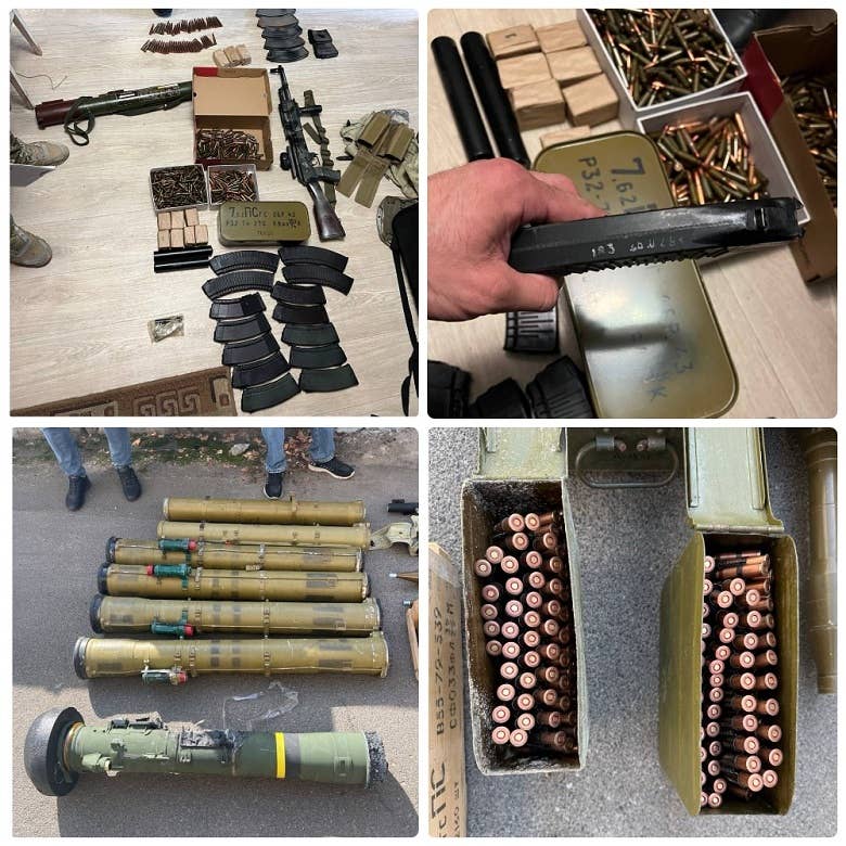 Police found a U.S.-provided disposable Javelin shoulder-fired anti-tank weapon launch tube (lower left) among the weapons seized. (Ukrainian National Police photo)