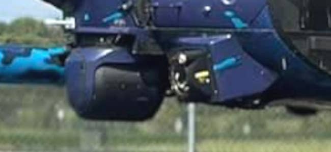 Components of the MH-60M's DVEPS can be seen on either side of the sensor turret under its nose. <em>Pryor Field Airport Authority</em>