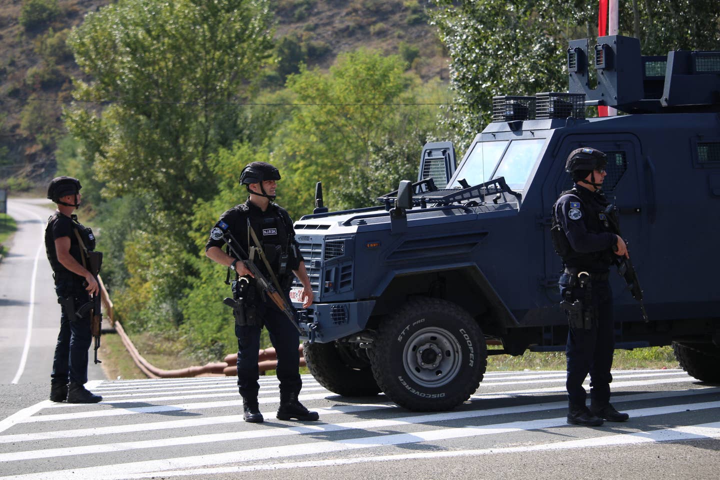 September 30, 2023: Kosovo police officers and members of the NATO Peacekeeping Force in Kosovo (KFOR) conduct search, patrol, and control activities in the region after the violence in Banjska in the north of the country on September 24. <em>Photo by Erkin Keci/Anadolu Agency via Getty Images</em>