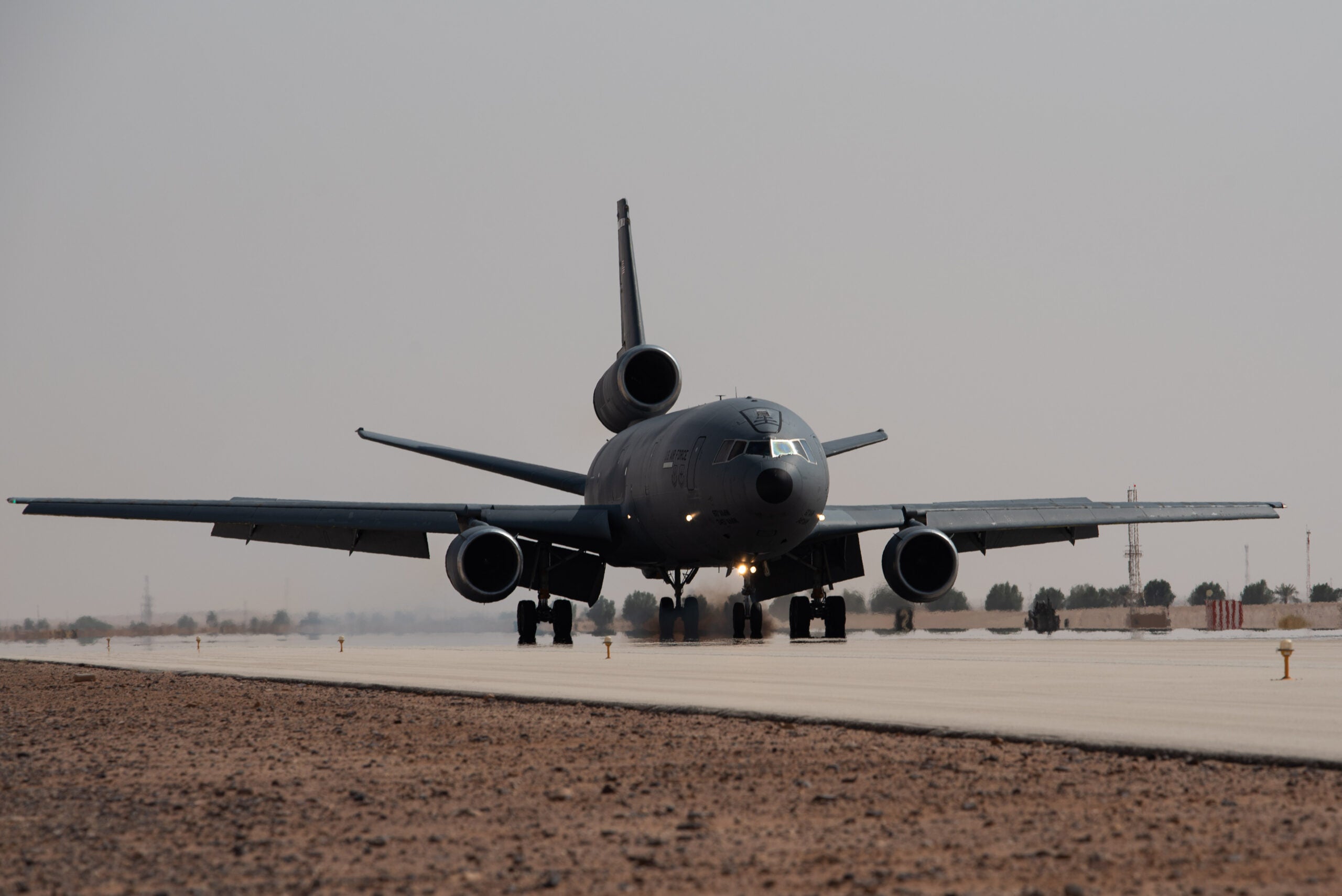 A KC-10 Extender assigned to the 908th Air Refueling Squadron lands after conducting the airframe's final combat sortie before inactivation at Prince Sultan Air Base, Kingdom of Saudi Arabia, Oct. 3, 2023. The flight served as a capstone for the KC-10 after over 30 years of service within the U.S. Air Forces Central (AFCENT) Area of Responsibility. By September 2024, the U.S. Air Force's fleet of KC-10s will be decommissioned and gradually replaced by the KC-46 aircraft. (U.S. Air Force photo by Tech. Sgt. Alexander Frank)