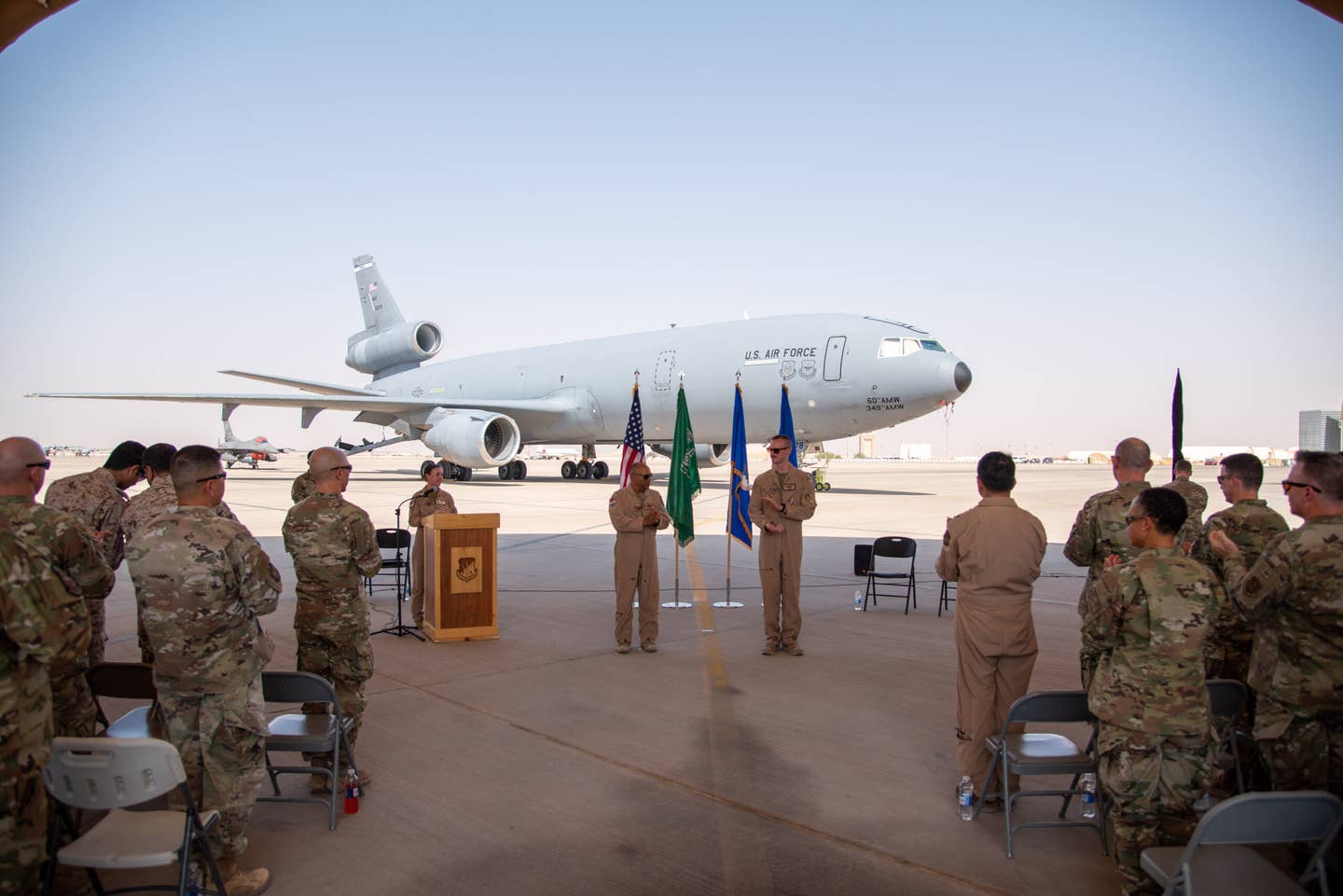 U.S. airmen from the 378th Air Expeditionary Wing celebrate after an inactivation ceremony for the 908th Expeditionary Air Refueling Squadron at Prince Sultan Air Base, Oct. 4, 2023. <em>U.S. Air Force photo by Tech. Sgt. Alexander Frank</em>