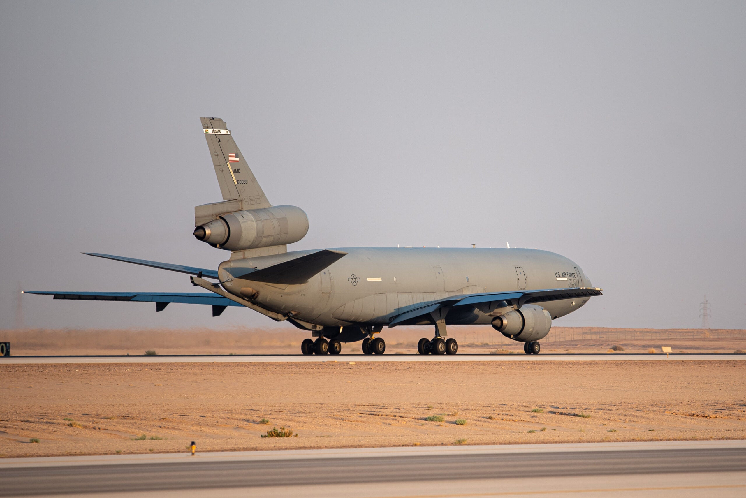 A KC-10 Extender departs after conducting the airframe's final combat deployment at Prince Sultan Air Base (PSAB), Kingdom of Saudi Arabia, Oct. 5, 2023. The departure of the KC-10 at PSAB marked the end of the airframe's over 30 years of service within the U.S. Air Forces Central (AFCENT) Area of Responsibility. By September 2024, the U.S. Air Force's fleet of KC-10s will be decommissioned and gradually replaced by the KC-46 aircraft. (U.S. Air Force photo by Tech. Sgt. Alexander Frank)