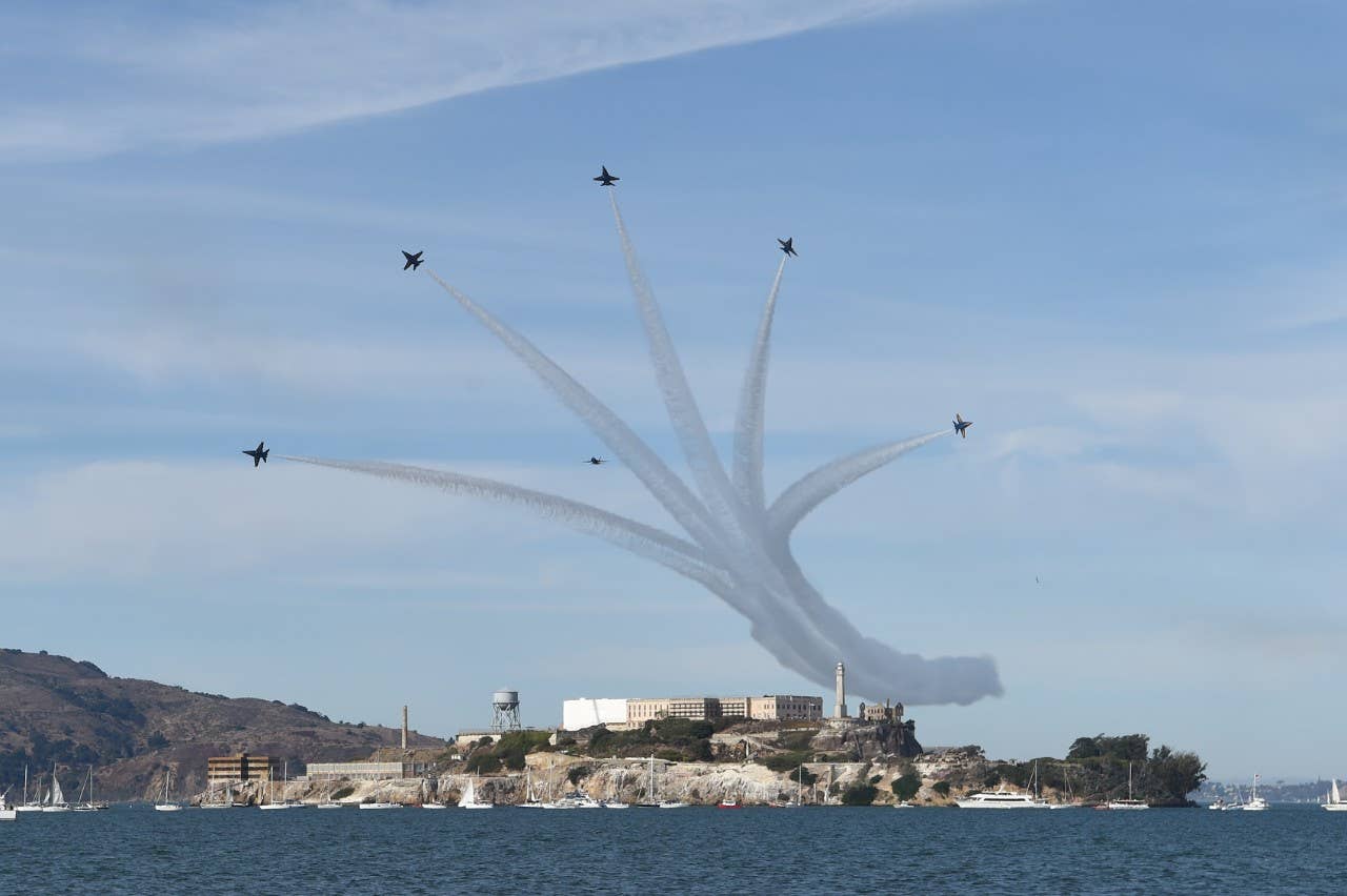 What the Blue Angels' iconic breakout maneuver looks like from San Fransisco's shoreline. This was taken during a 2016 performance. The Blues headline Fleet Week each year. (USN)