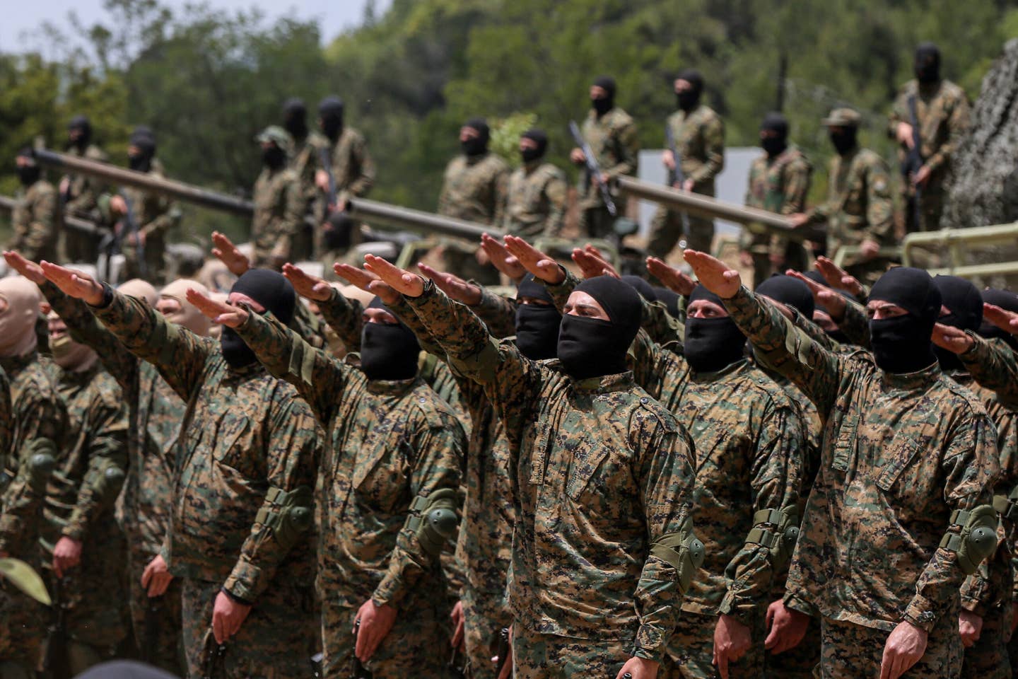 21 May 2023, Lebanon, Aramta: Pro-Iranian Hezbollah fighters take the oath during a staged military exercise in a camp in the Lebanese southern village of Aramta. The show came ahead of the 23rd "Liberation Day", the annual celebration of the withdrawal of Israeli forces from south Lebanon on May 25, 2000. Photo: Marwan Naamani/dpa (Photo by Marwan Naamani/picture alliance via Getty Images)