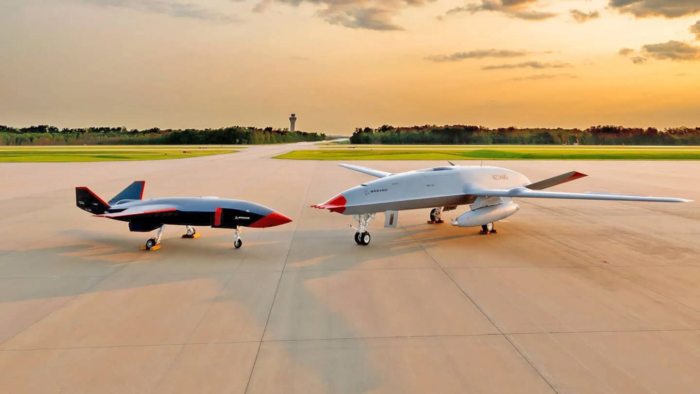 Boeing's MQ-28 Ghost Bat and its MQ-25 Stingray tanker sitting side by side, a potential vision of the future of naval aviation. (Boeing)