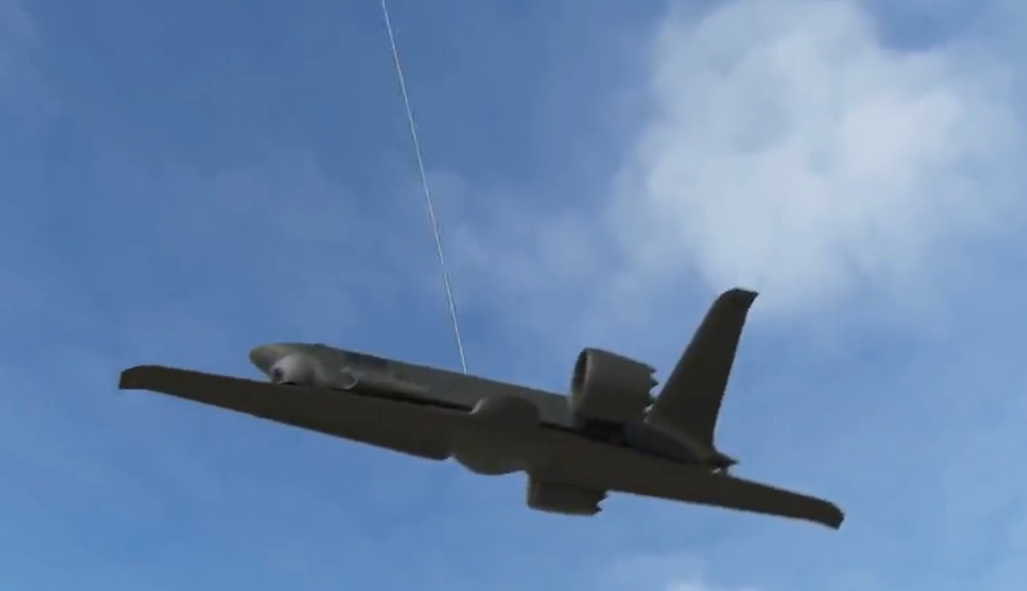A screen cap from a GA-ASI video showing a simulated Sparrowhawk folding its wings after being recovered on the towline. Note the external-mounted engines. <em>GA-ASI</em>