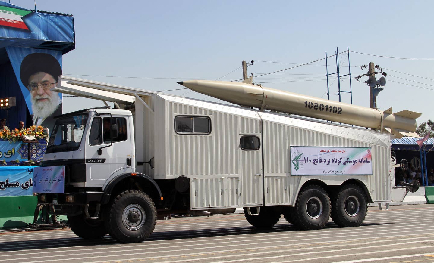 A military truck parades the Fateh-110 SRBM during a military parade in the Iranian capital Tehran on September 22, 2010. <em>ATTA KENARE/AFP via Getty Images</em>