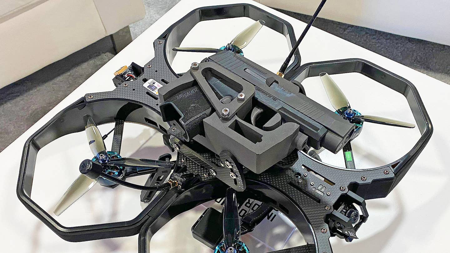 Gun maker Sig Sauer is experimenting with pistol-armed quadcopter drones.