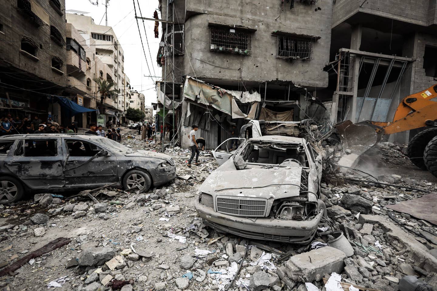 The rubble of destroyed buildings and cars after an Israeli air strike in Gaza City, on October 9, 2023.  (Photo by Sameh Rahmi/NurPhoto via Getty Images)