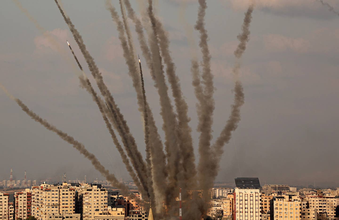 Palestinian militants fire a salvo of rockets in response to Israeli airstrikes in Gaza City, on October 10, 2023. <em>Photo by Ahmed Zakot/SOPA Images/LightRocket via Getty Images</em>