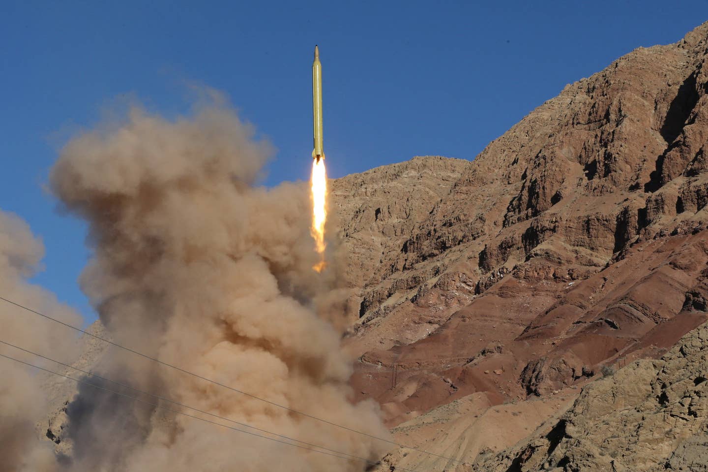 An Iranian Ghadr ballistic missile is launched during a test in northern Iran on March 9, 2016. <em>Photo by MAHMOOD HOSSEINI/TASNIM NEWS/AFP via Getty Images</em>