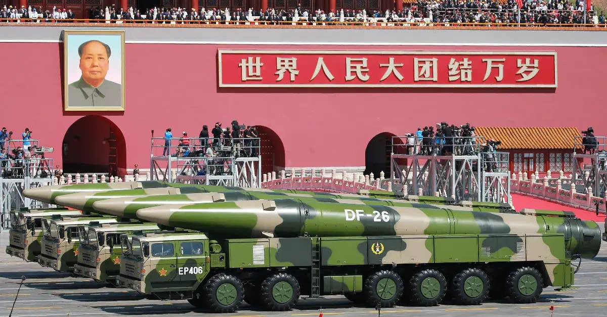 DF-26 intermediate-range ballistic missiles on parade. <em>Imaginechina via AP</em>