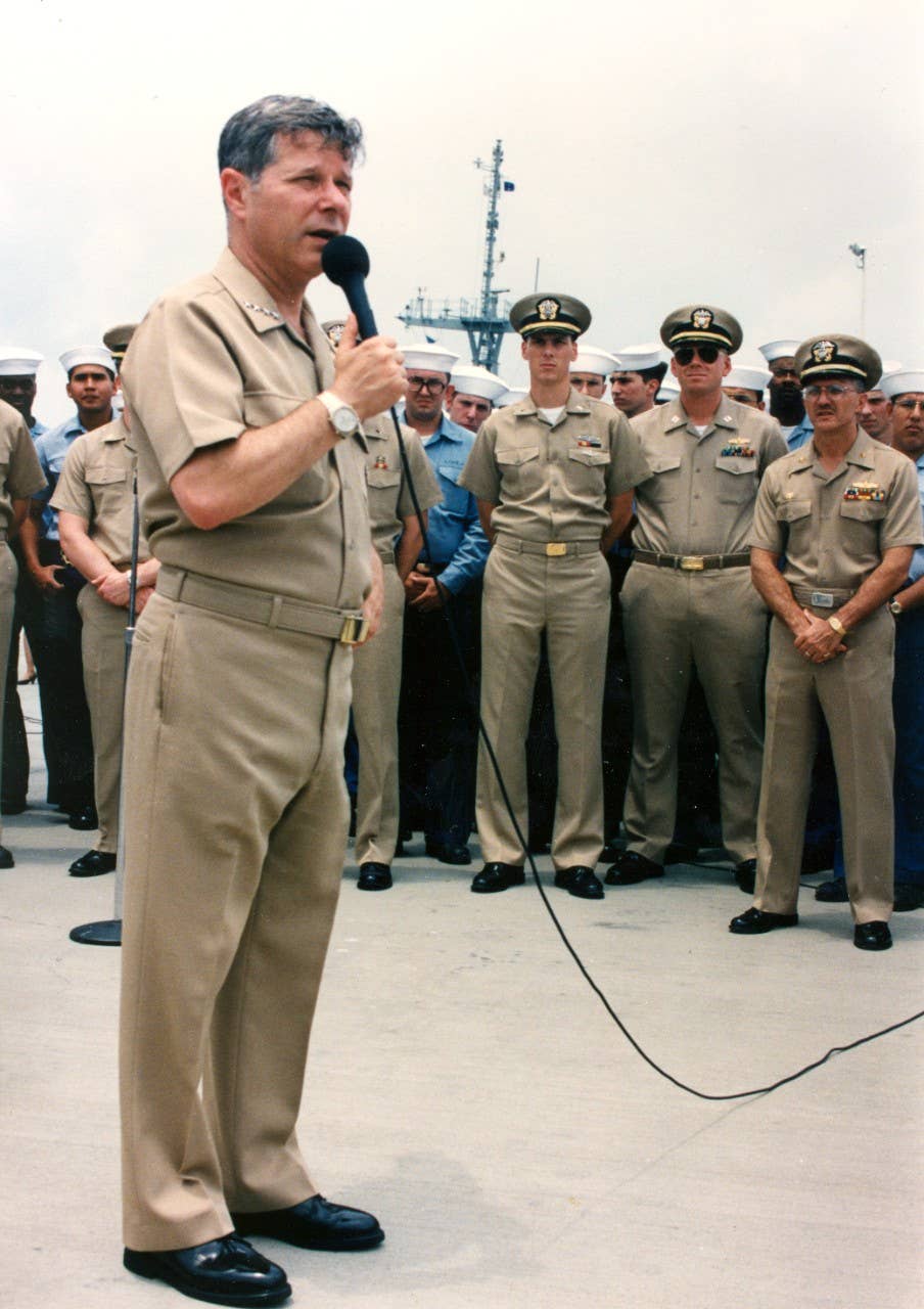 Admiral Jeremy M. Boorda, chief of Naval Operations, addresses the assembled crews of the mine-countermeasures squadron homeported at Naval Air Station Ingleside, May 12, 1994. <em>Naval History and Heritage Command</em>