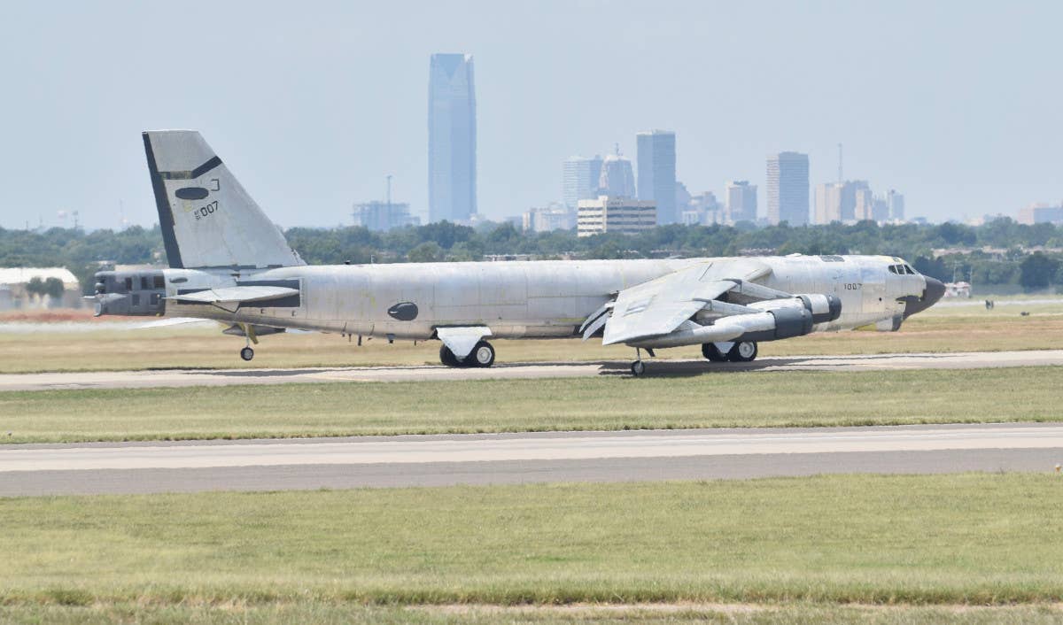 A B-52 stripped of most of its paint at Tinker Air Force Base in 2016. The particular aircraft seen here, nicknamed Ghost Rider, was in the process of a lengthy reactivation process after years in storage at the boneyard at Davis-Monthan Air Force Base in Arizona. <em>USAF</em>