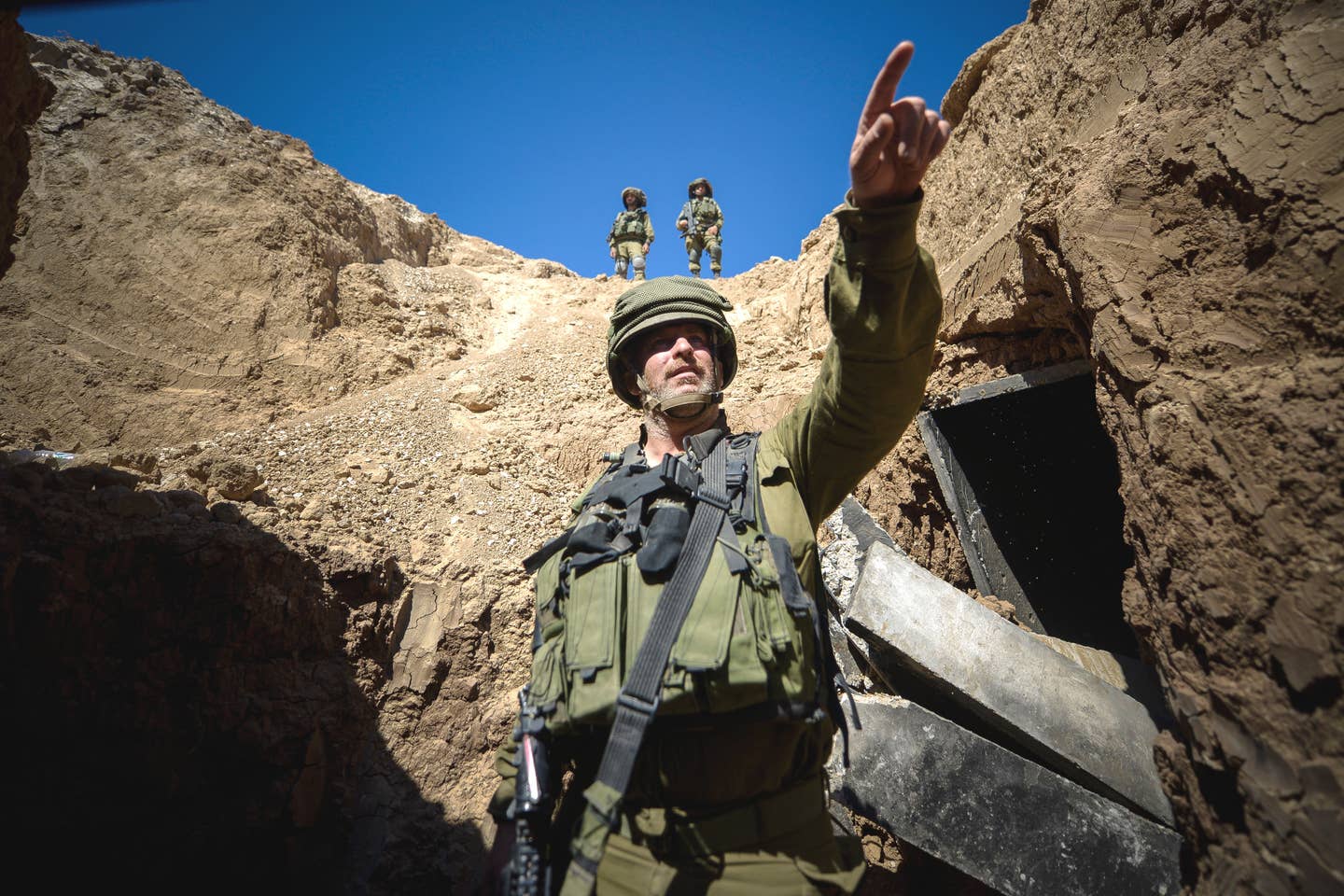 Israeli forces at one end of a tunnel that the Palestinian terrorist group Hamas dug from the Gaza Strip into Israel in 2014. <em>IDF</em>