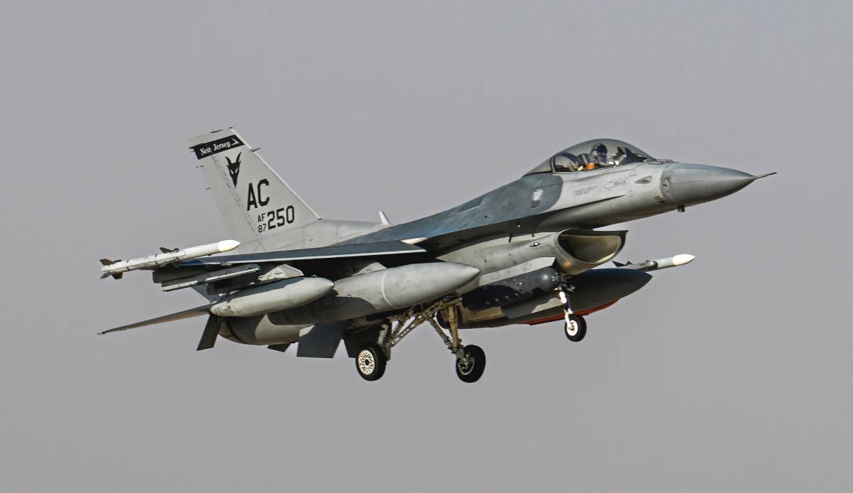 An F-16C Viper assigned to the New Jersey Air National Guard’s 119th Expeditionary Fighter Squadron lands a base somewhere in the Middle East on October 24, 2023.<em> USAF</em>