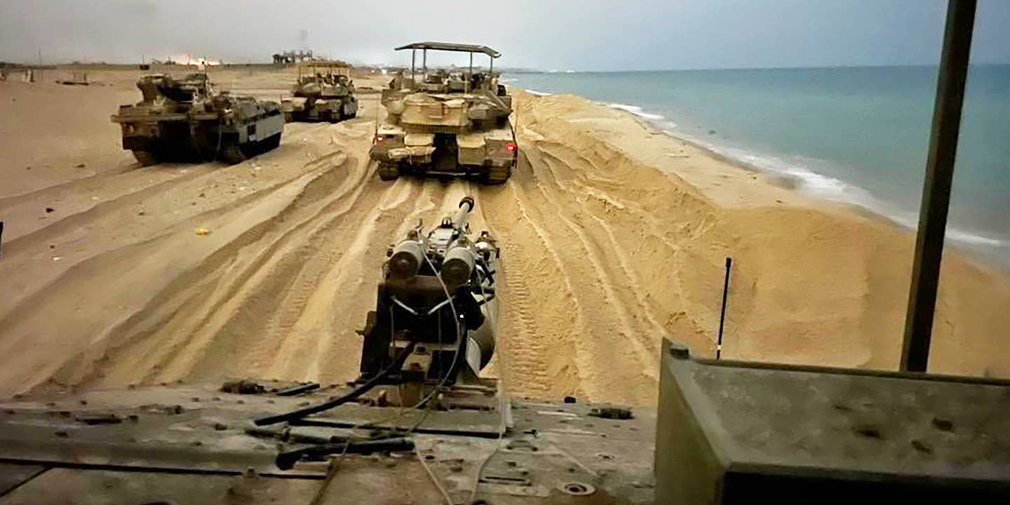 Merkava tanks roll on the Gaza beach
