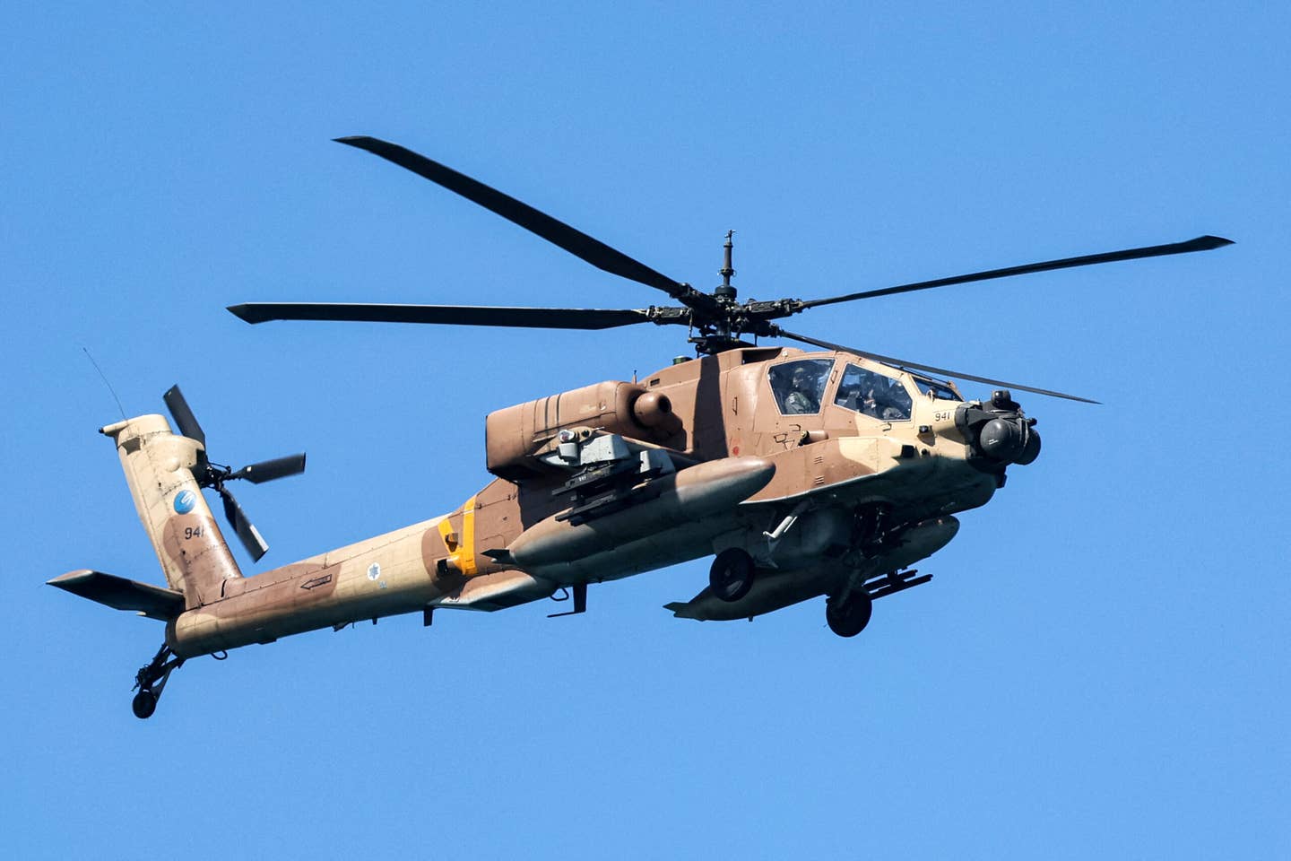 A pod-equipped AH-64A during an airshow in Tel Aviv on April 26, 2023, marking 75 years since the establishment of the Jewish state. <em>Photo by JACK GUEZ/AFP via Getty Images</em>