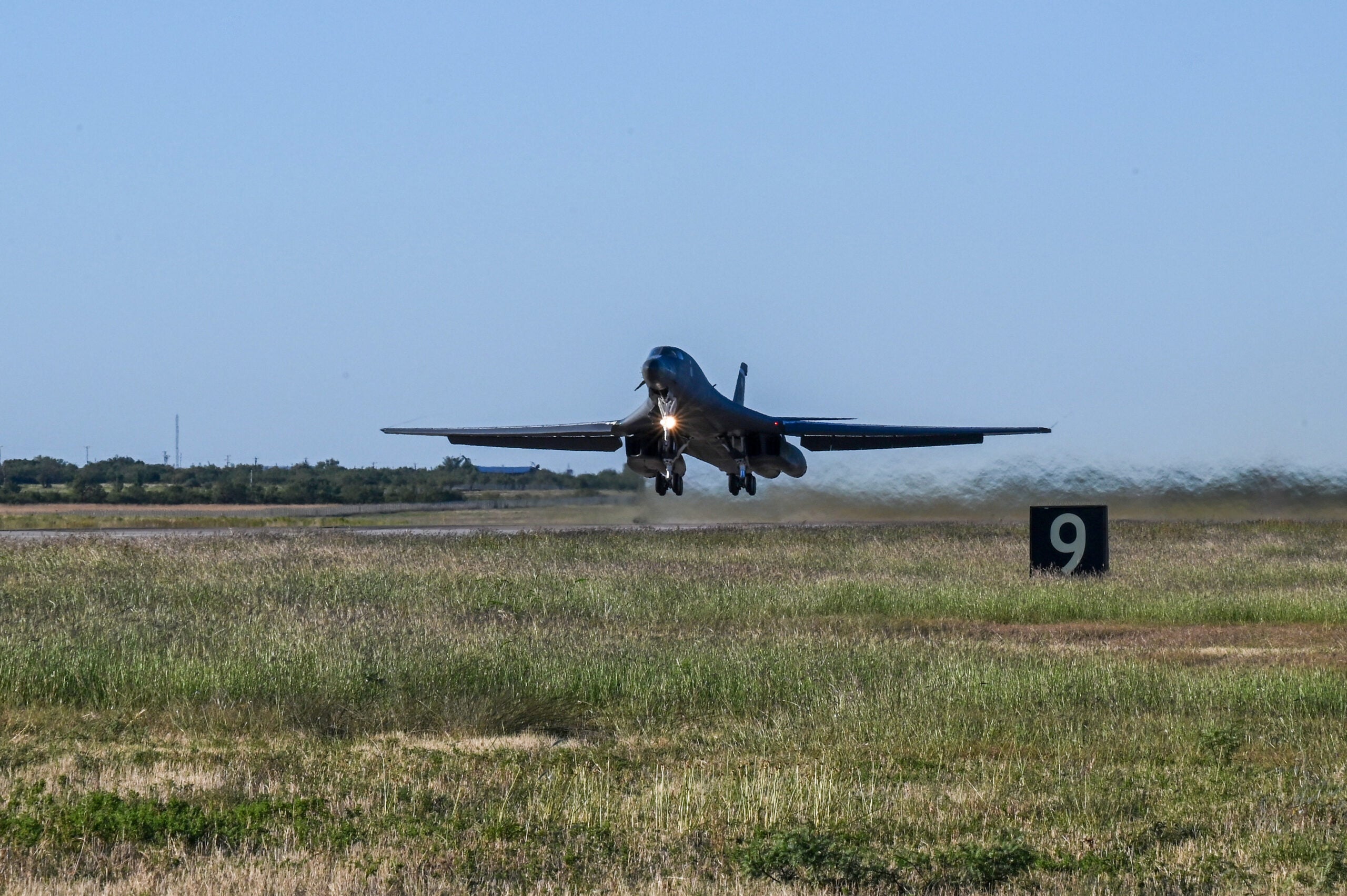 A B-1B Lancer takes off from Dyess Air Force Base, Texas, Oct. 11, 2023, to kick off a U.S. European Command Bomber Task Force deployment. The U.S. Air Force is engaged, postured, and ready with credible force to assure, deter, and defend in an increasingly complex security environment. (U.S. Air Force photo by Senior Airman Sophia Robello)