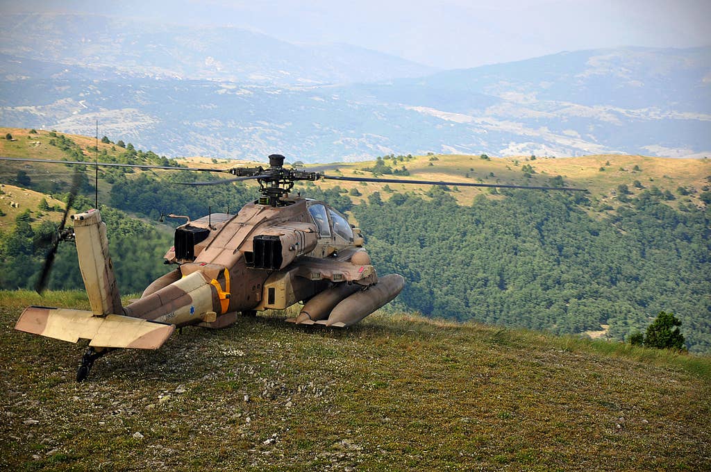 An AH-64A carrying a full load of four Reduced Size Crashworthy External Fuel System (RCEFS) tanks. <em>IAF</em>