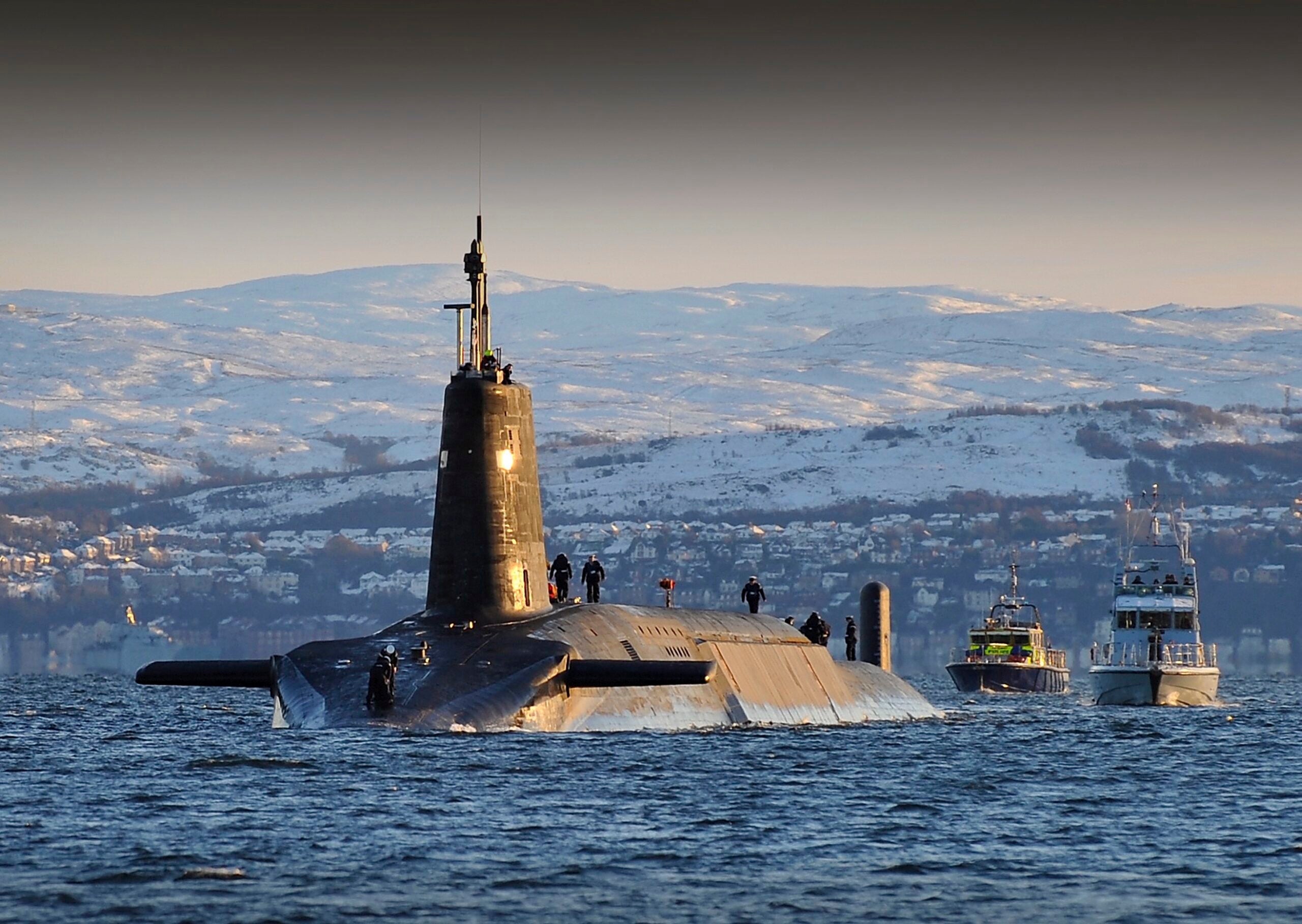 Nuclear submarine HMS Vanguard arrives back at HM Naval Base Clyde, Faslane, Scotland following a patrol.