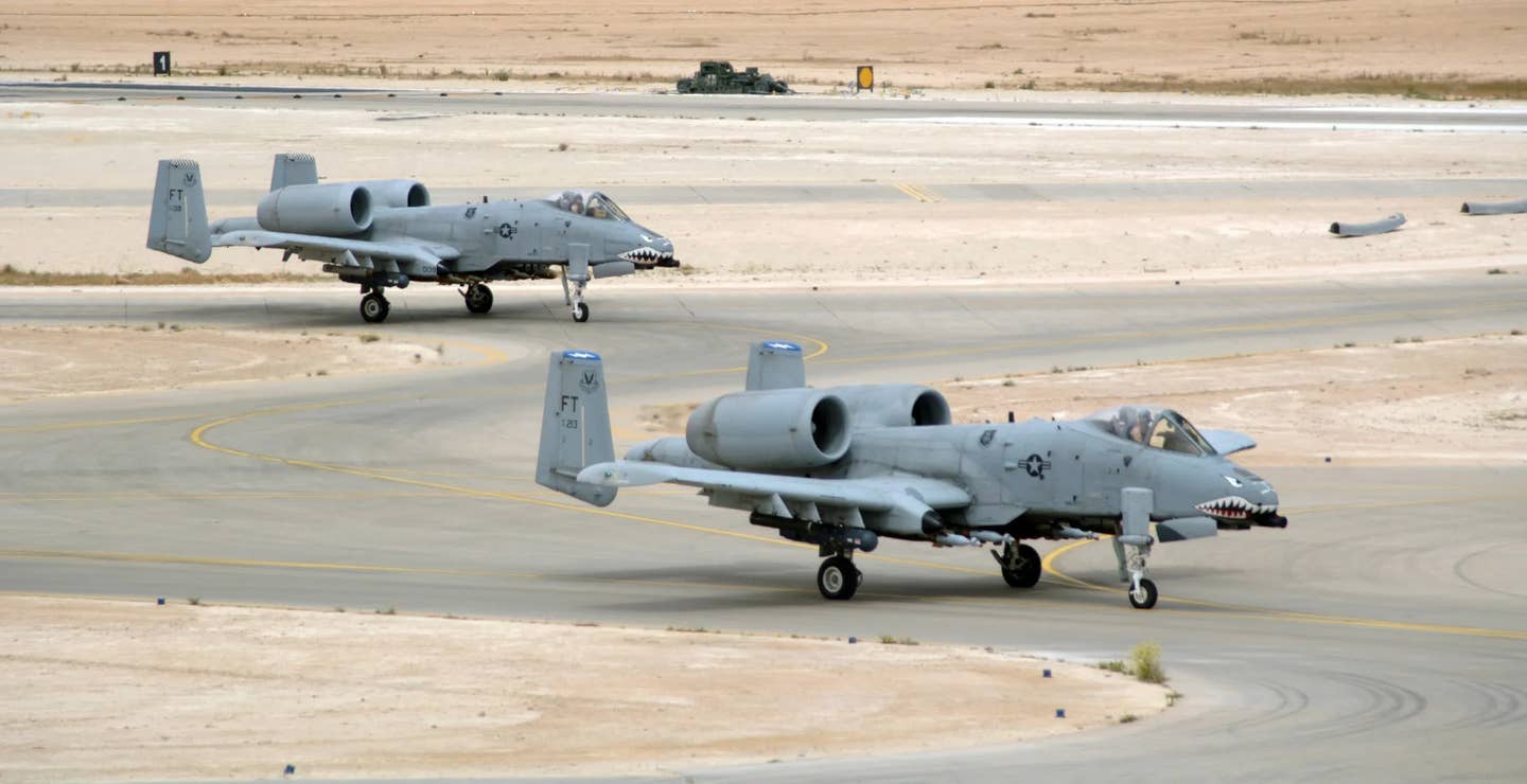 A pair of A-10s in Iraq in 2007. <em>USAF</em>