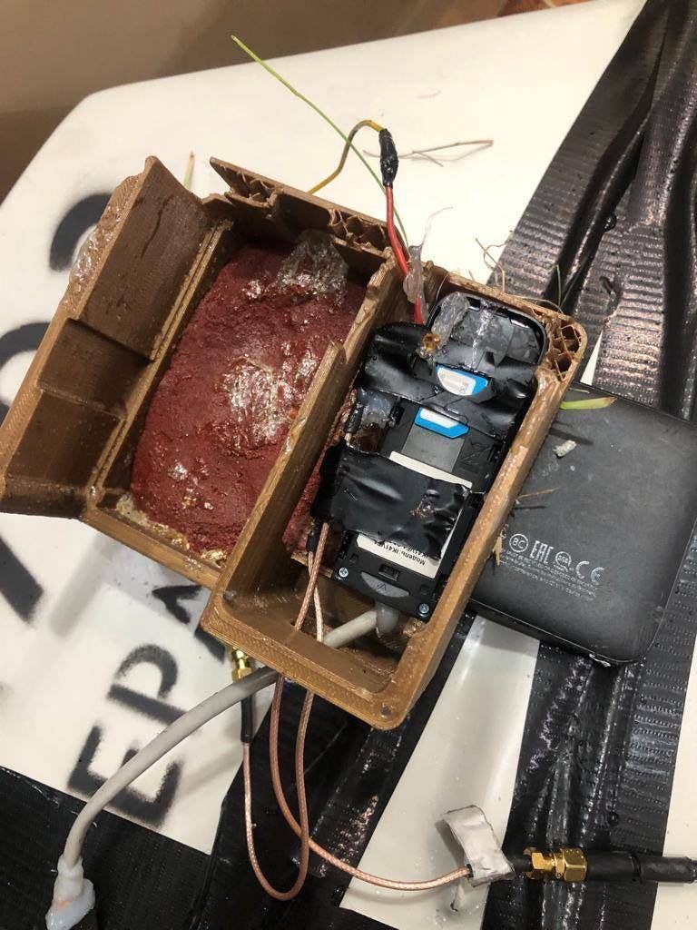 A closer look at the SIM card and modem found inside a downed Russian Shahed-type drone. (Via Twitter)