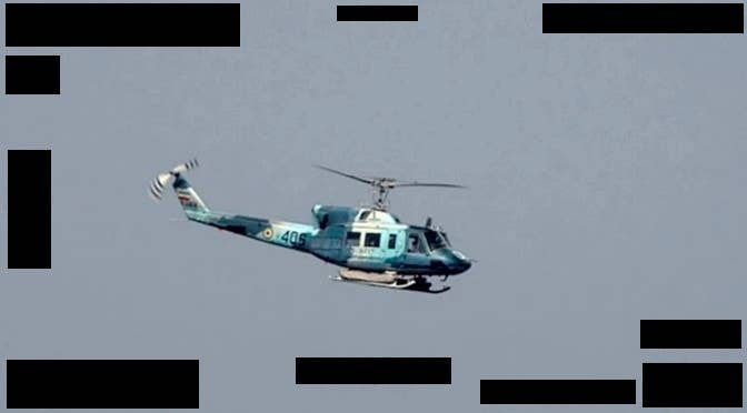 Another still image from a video taken by one of Task Force 59's USVs showing an Iranian helicopter. <em>USN</em>