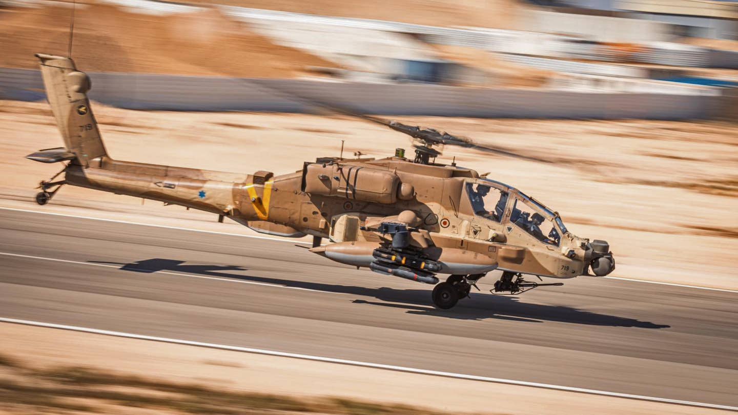 An Israeli Air Force AH-64 Apache with unusual Hellfire missile marking attached.