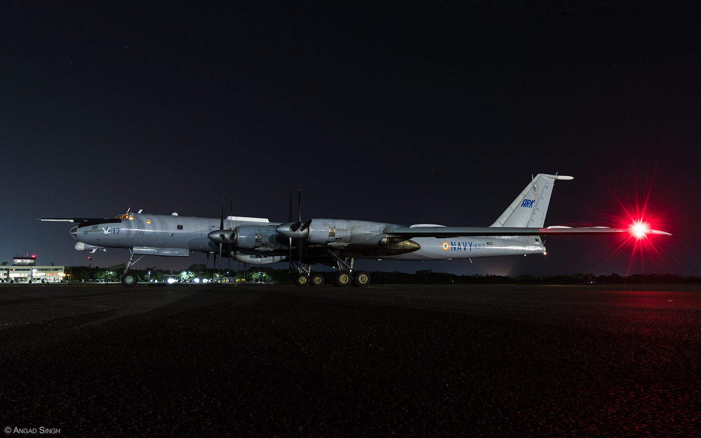A Bear at rest under the night sky — unlike the Il-38s and P-8Is, the Tu-142s spent the entirety of their 29 years parked in the open. <em>Angad Singh</em>