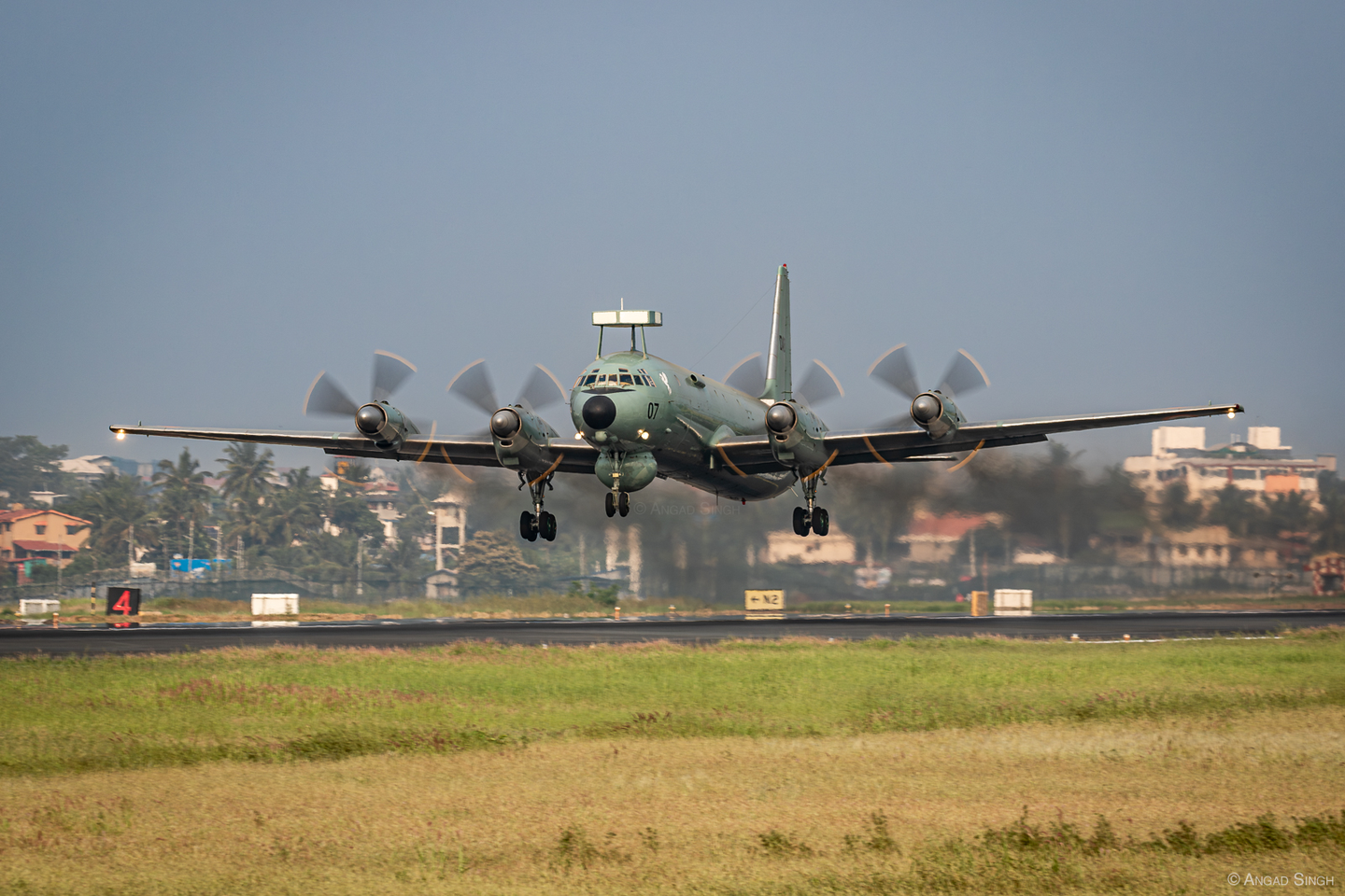 An Il-38 gets airborne trailing its signature engine smoke. <em>Angad Singh</em>